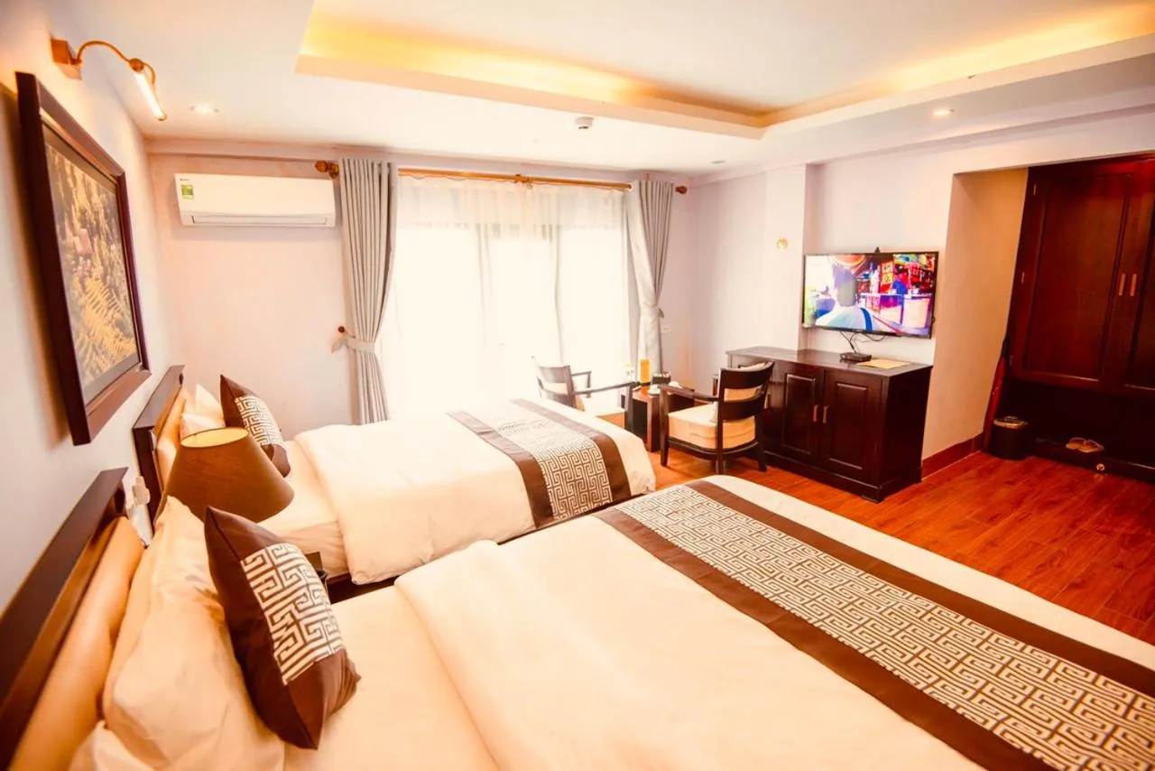 Bed in Le Bordeaux Sapa Hotel