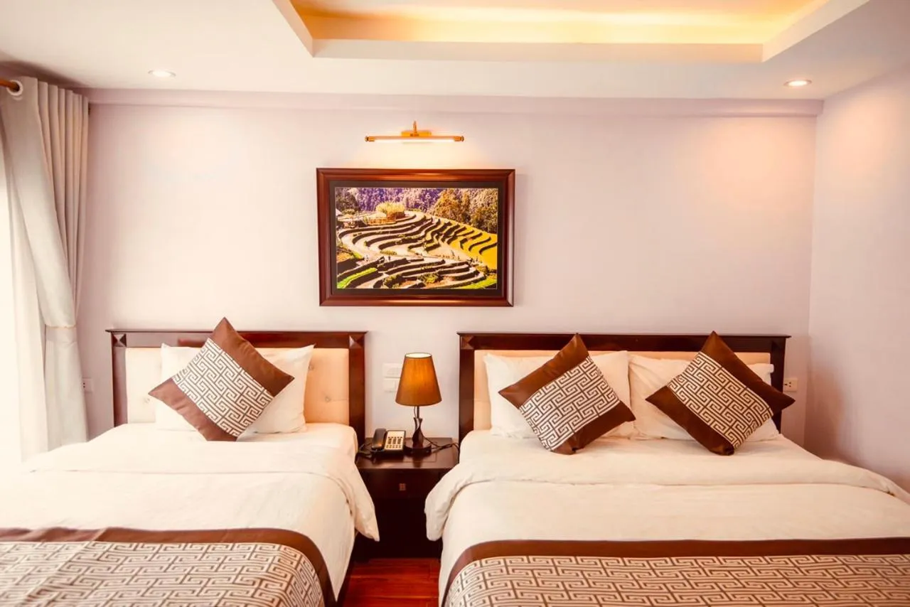 Bed in Le Bordeaux Sapa Hotel