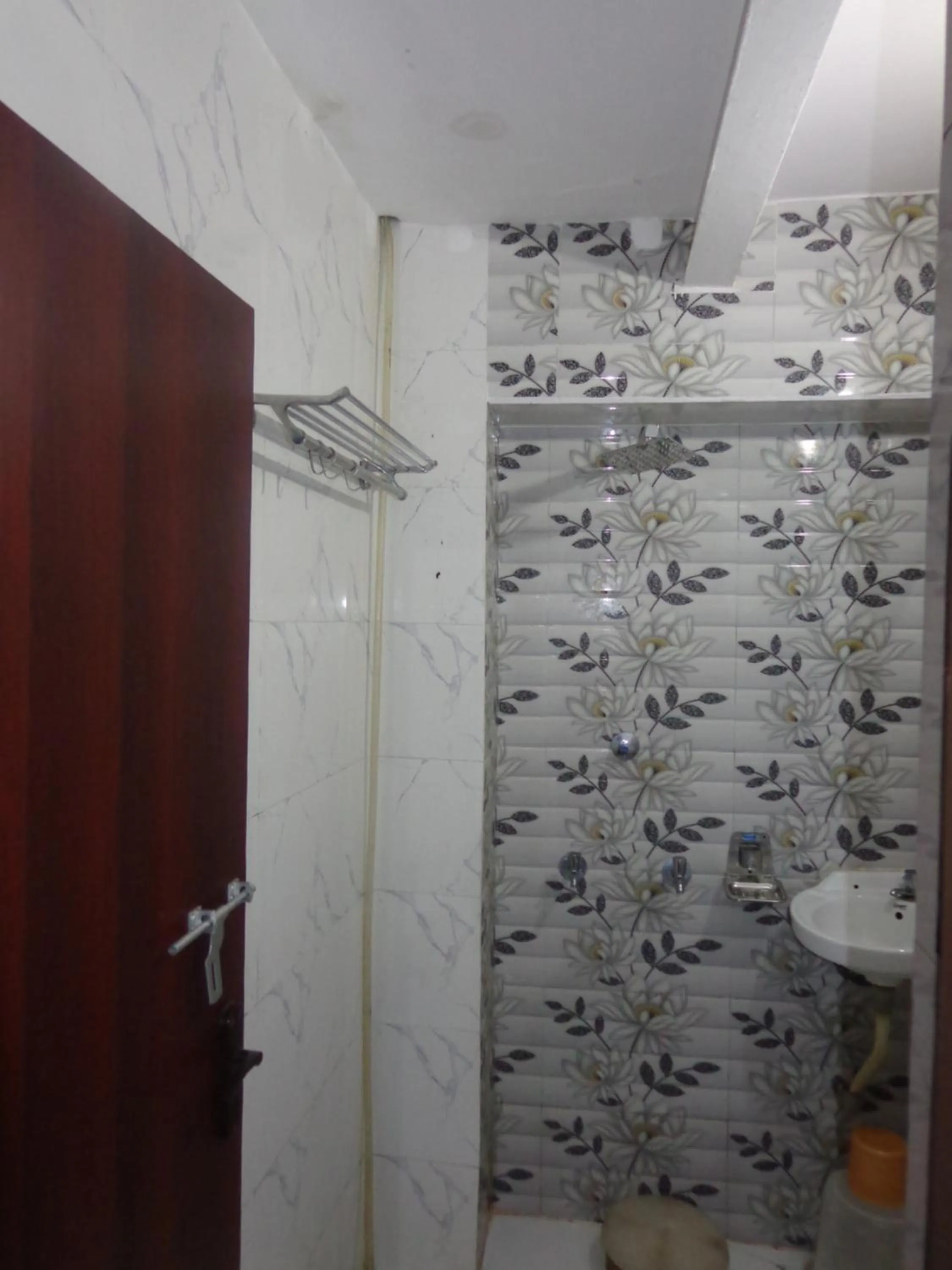 Bathroom in Luxmi Hotel