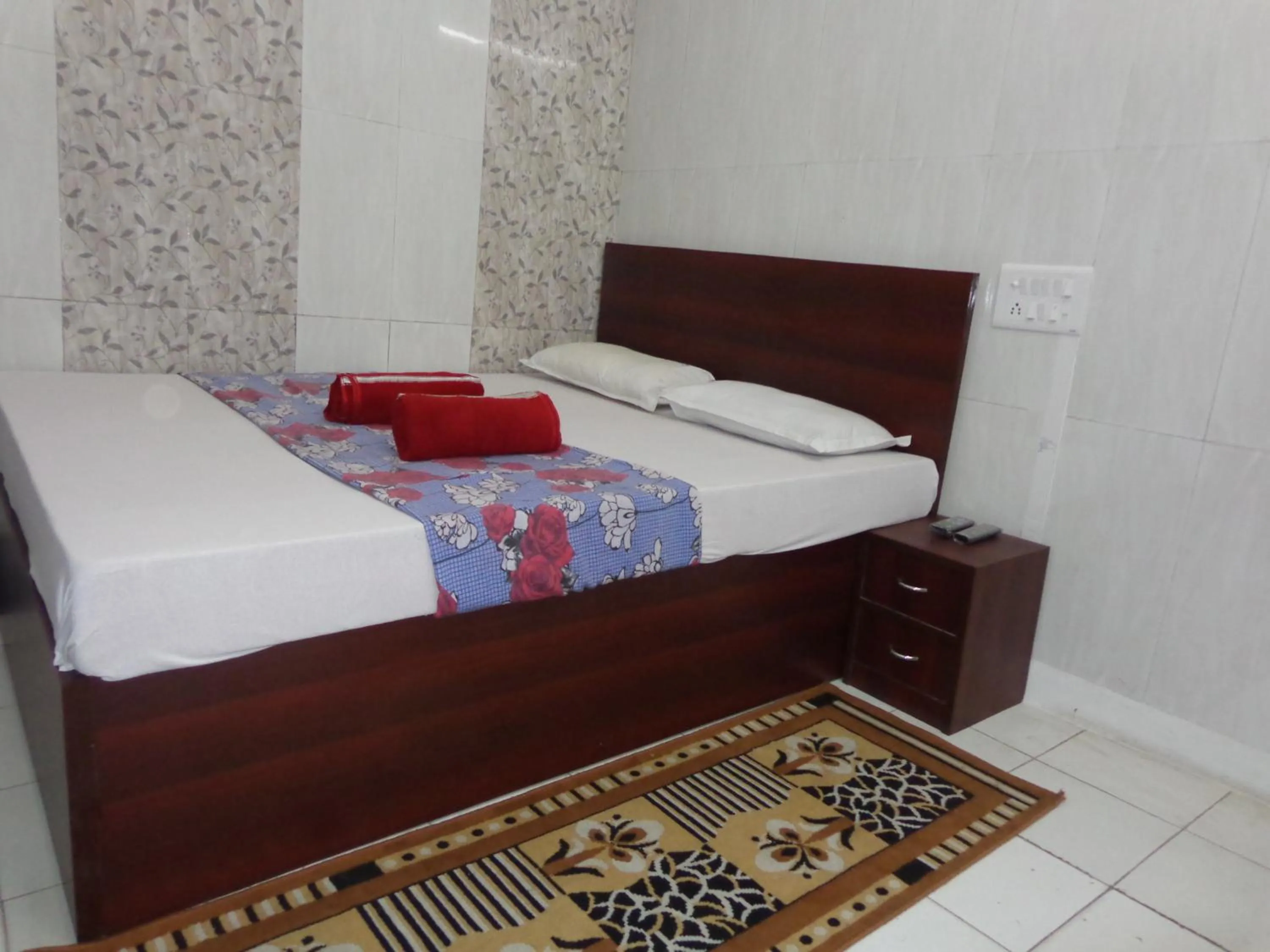 Photo of the whole room, Bed in Luxmi Hotel