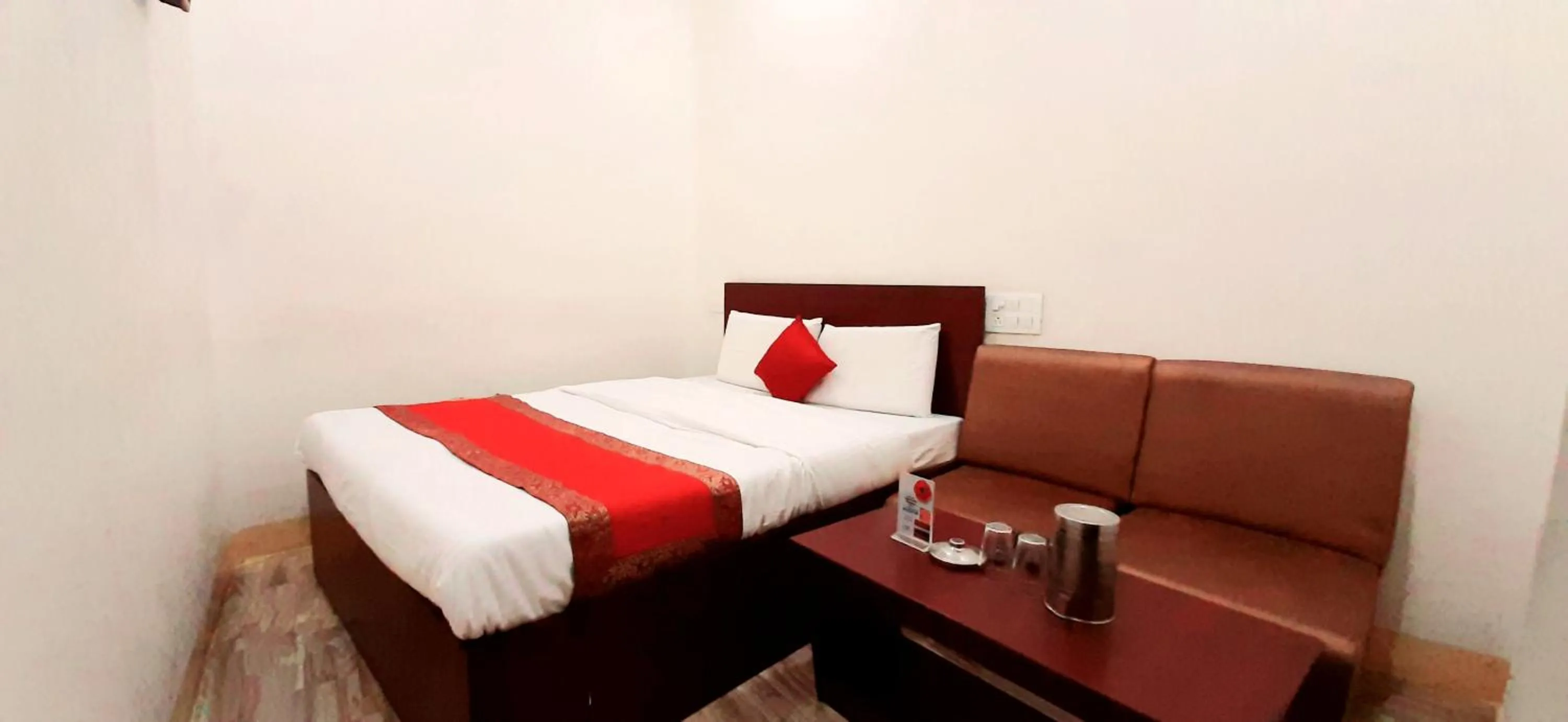 Photo of the whole room, Bed in Luxmi Hotel