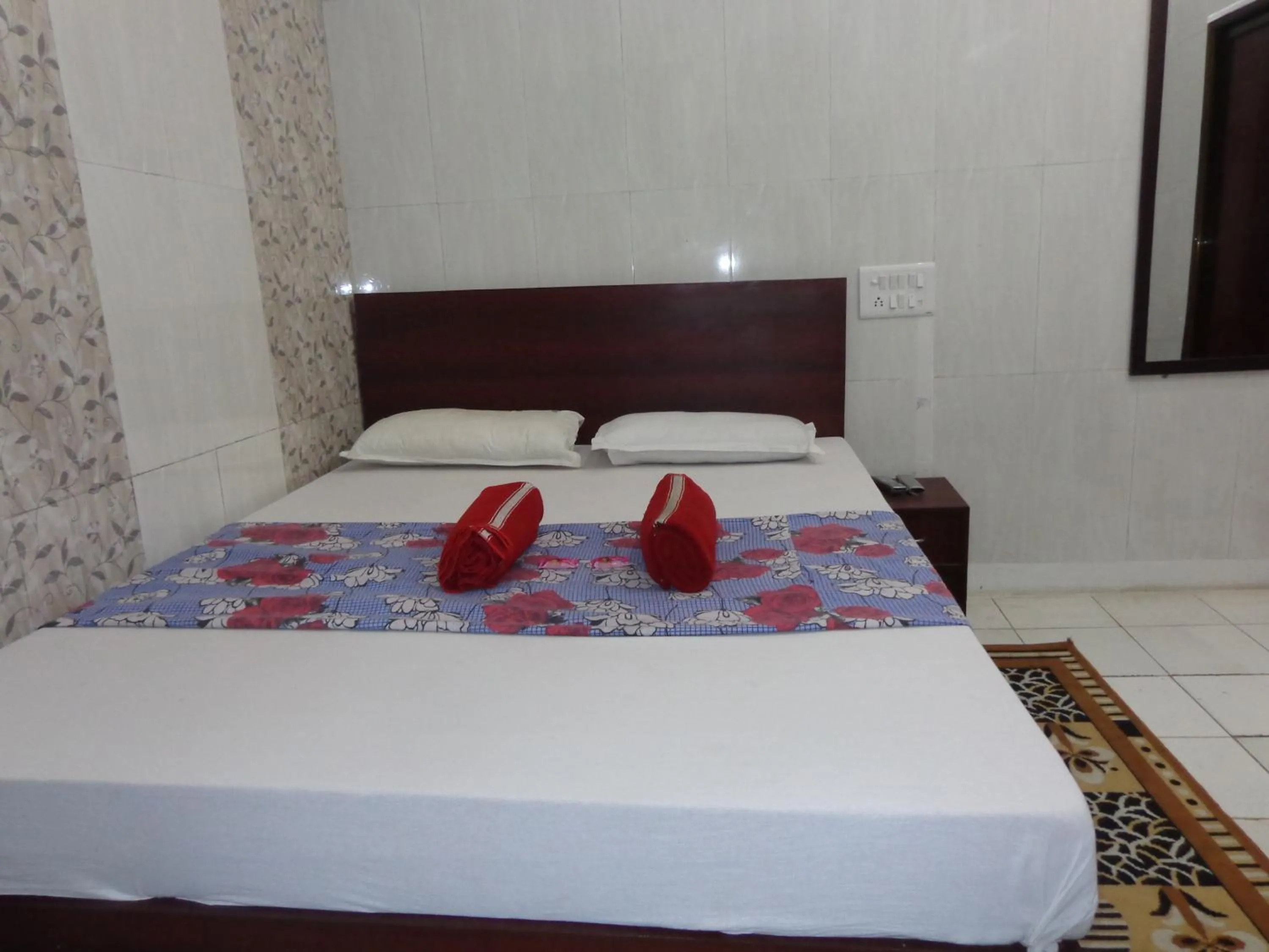 Photo of the whole room, Bed in Luxmi Hotel