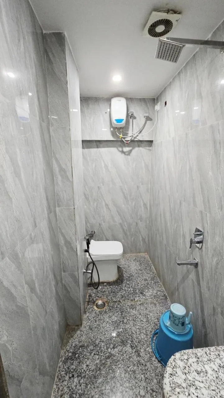 Bathroom in Luxmi Hotel