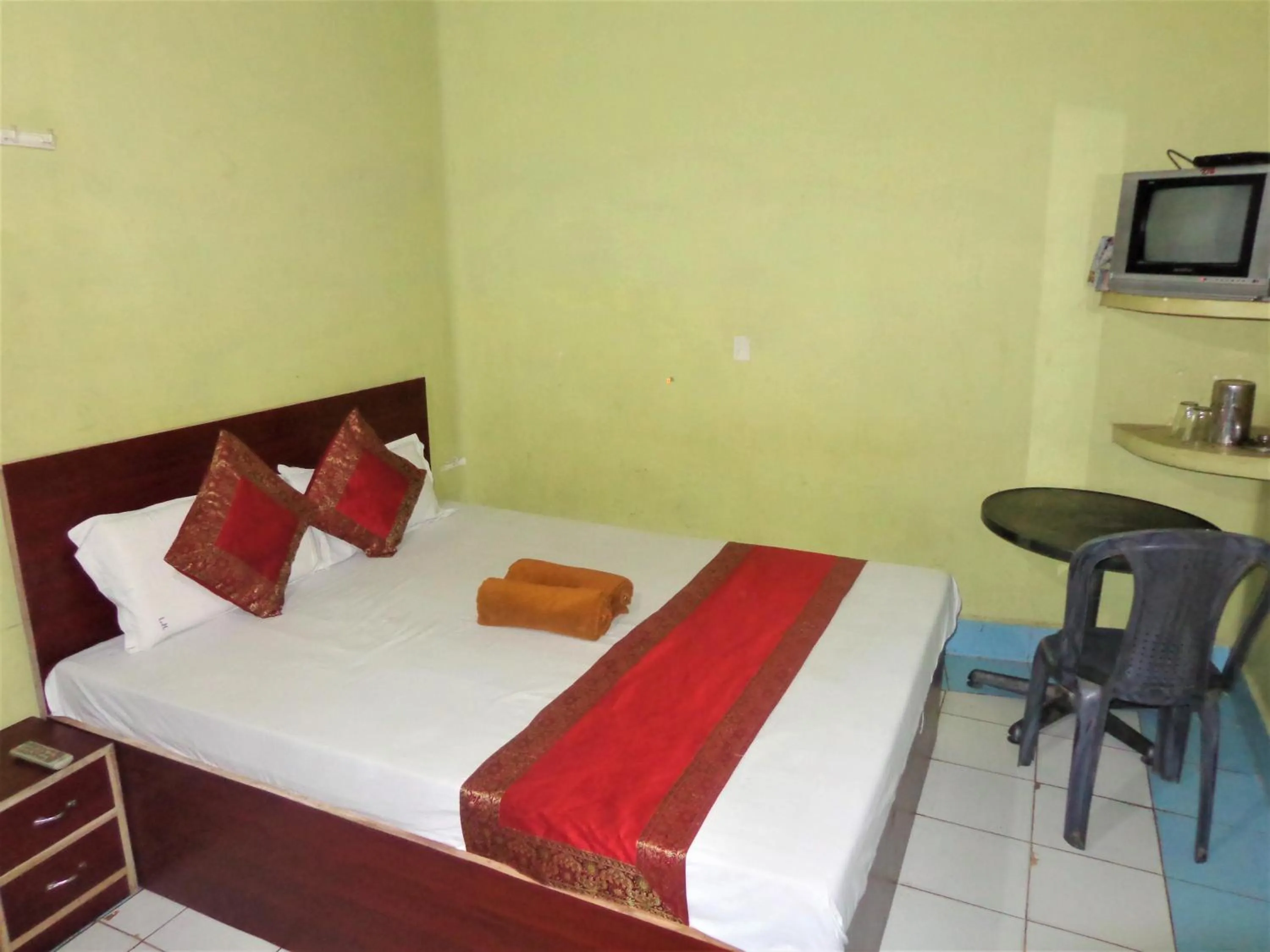 Photo of the whole room, Bed in Luxmi Hotel