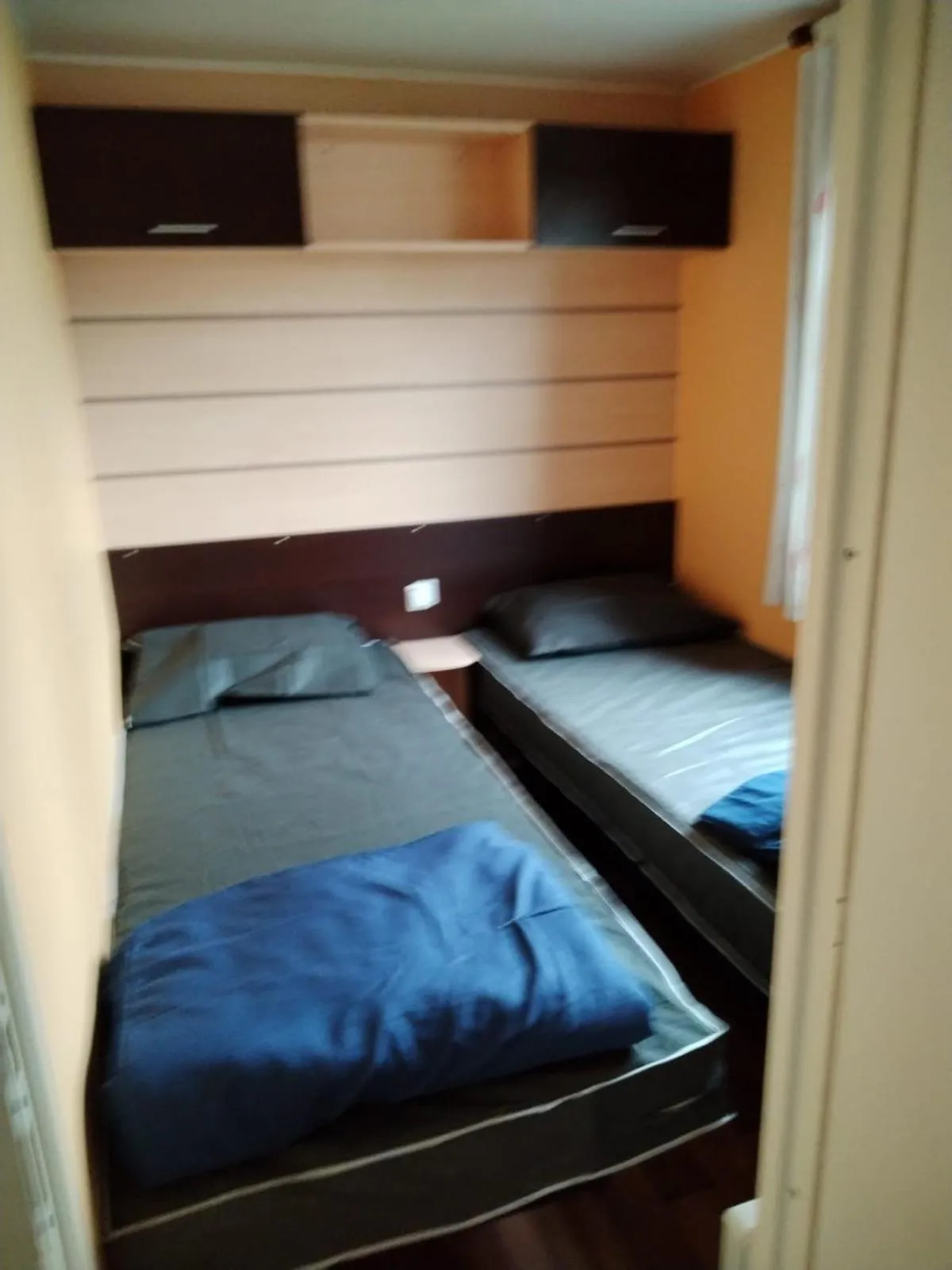 Bed in MOBIL HOME 43 dans Camping 4 Etoiles