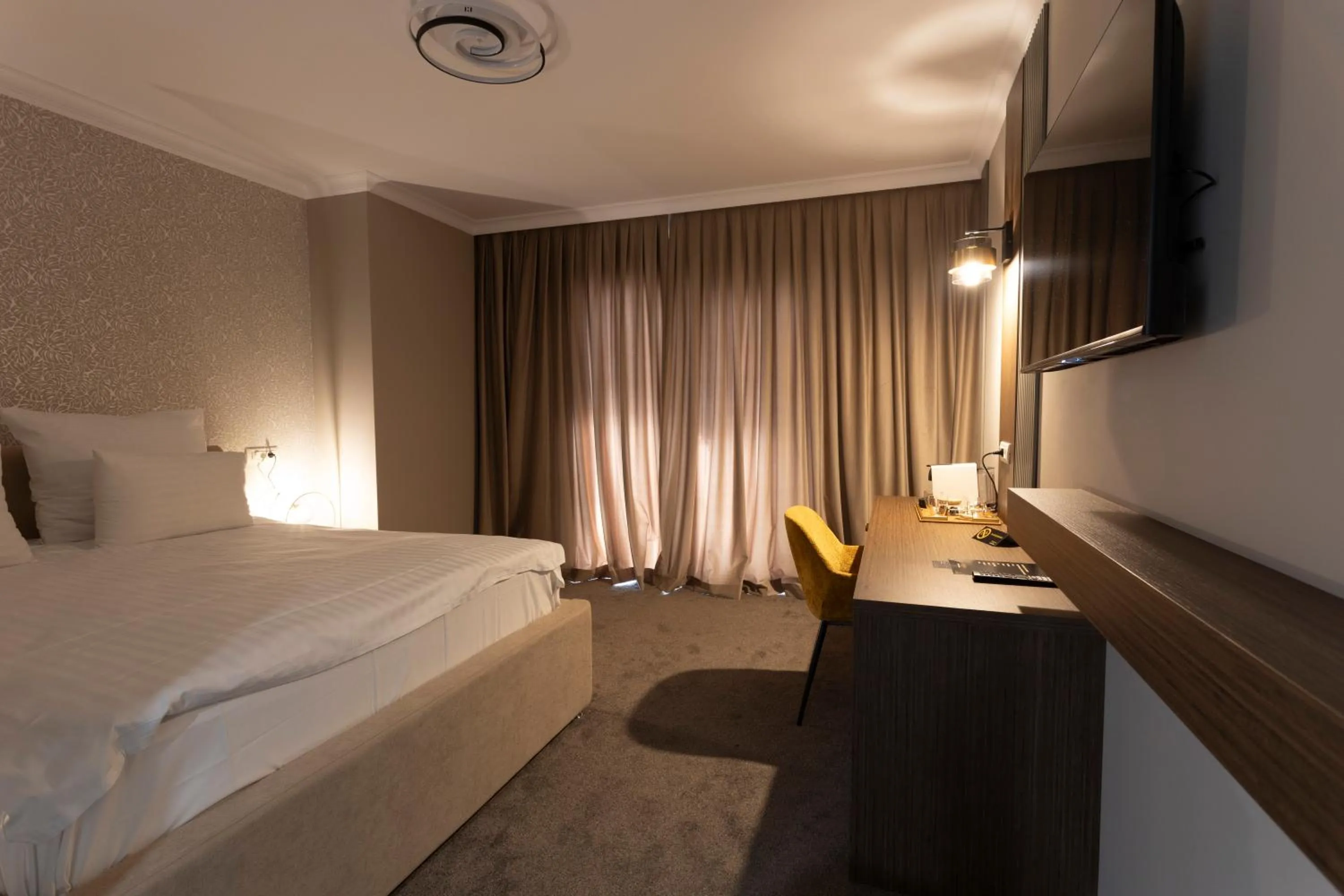 Bed in Ganzo Boutique Hotel