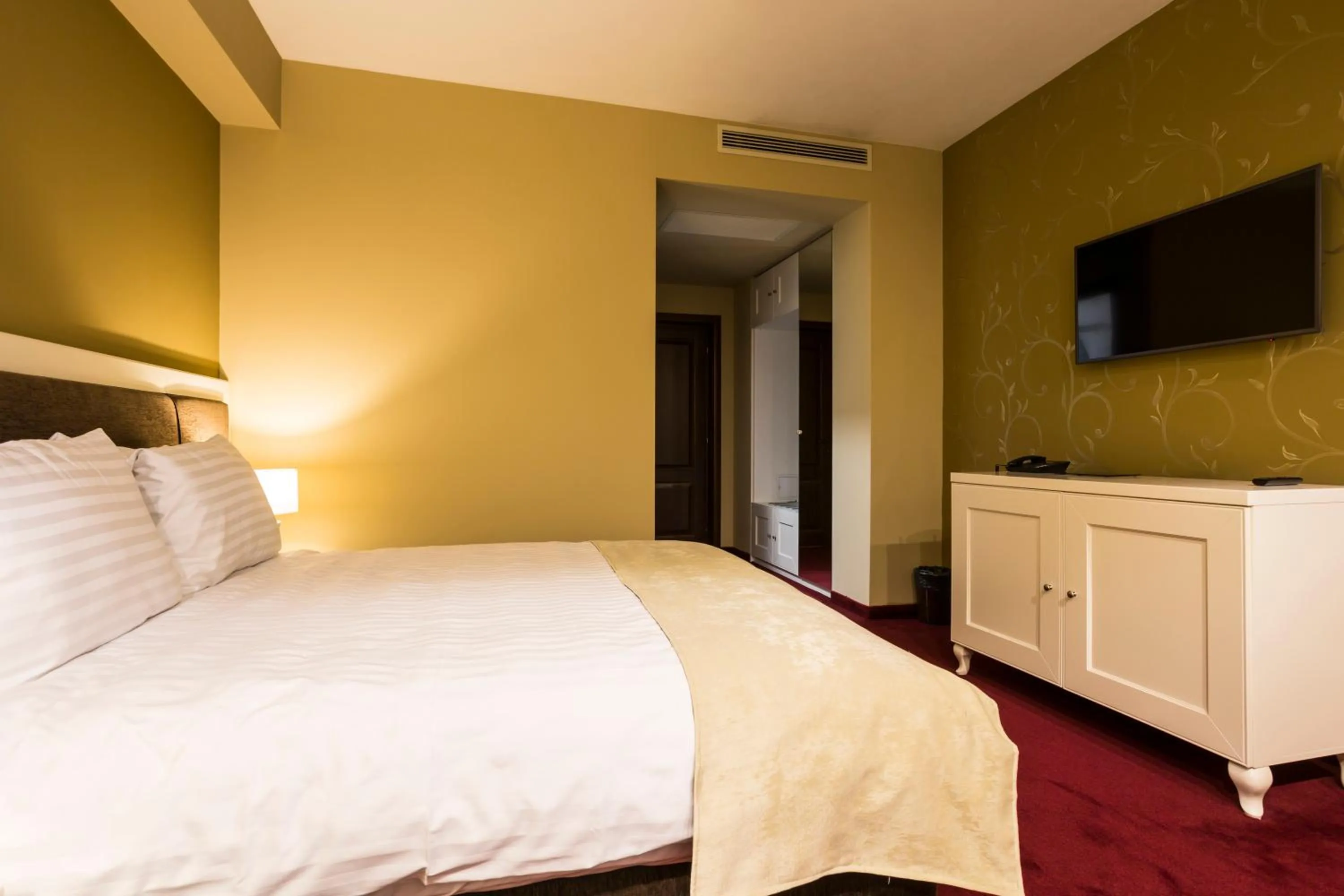 Bed in Ganzo Boutique Hotel