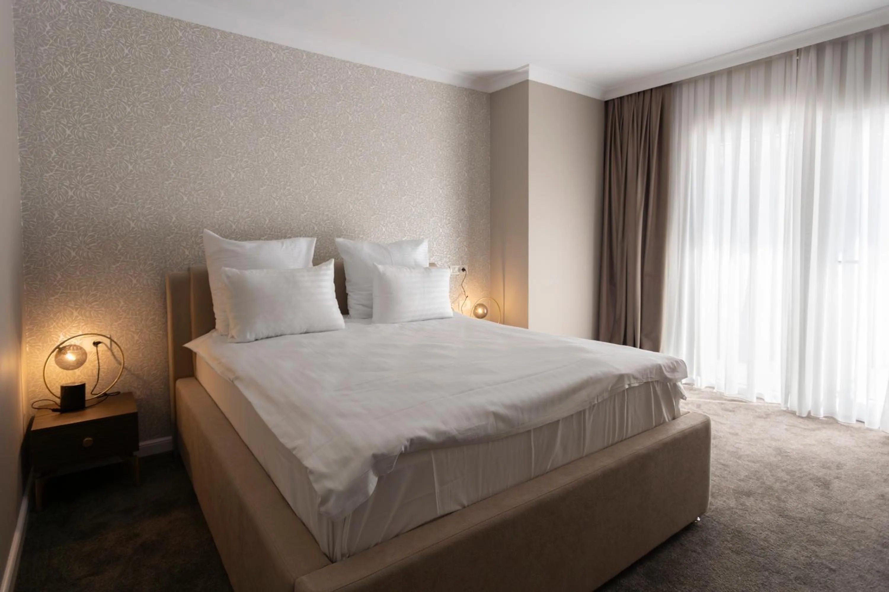 Bed in Ganzo Boutique Hotel