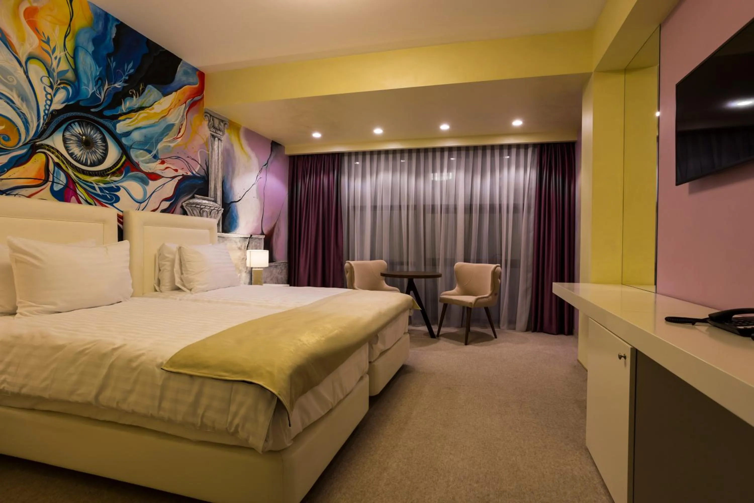 Bed in Ganzo Boutique Hotel