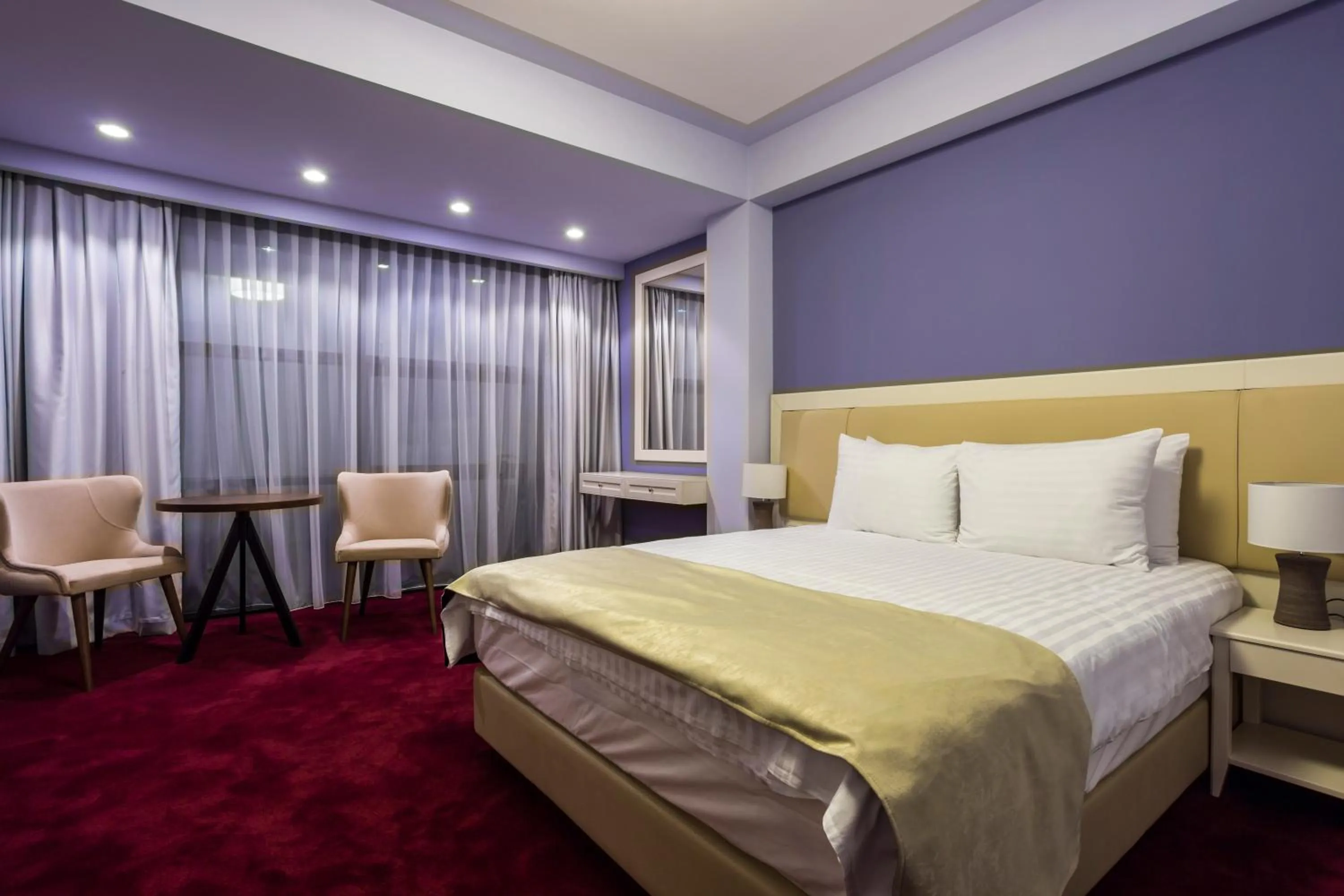 Bed in Ganzo Boutique Hotel