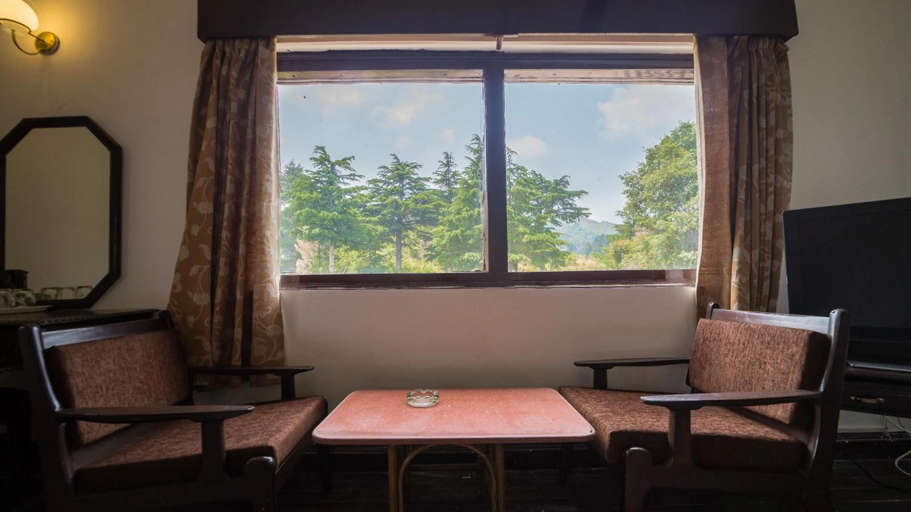 Seating area in Cedar Lodge By Aahma