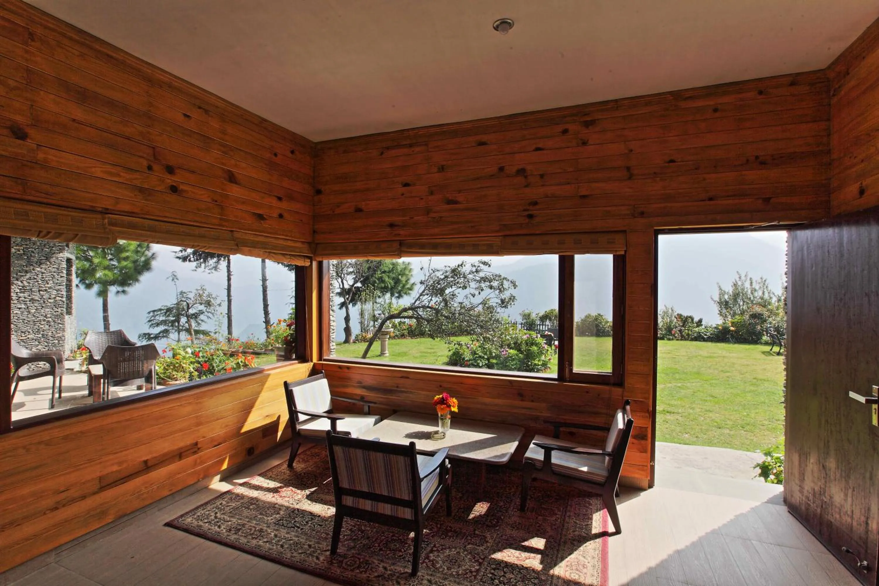 Living room in Cedar Lodge By Aahma
