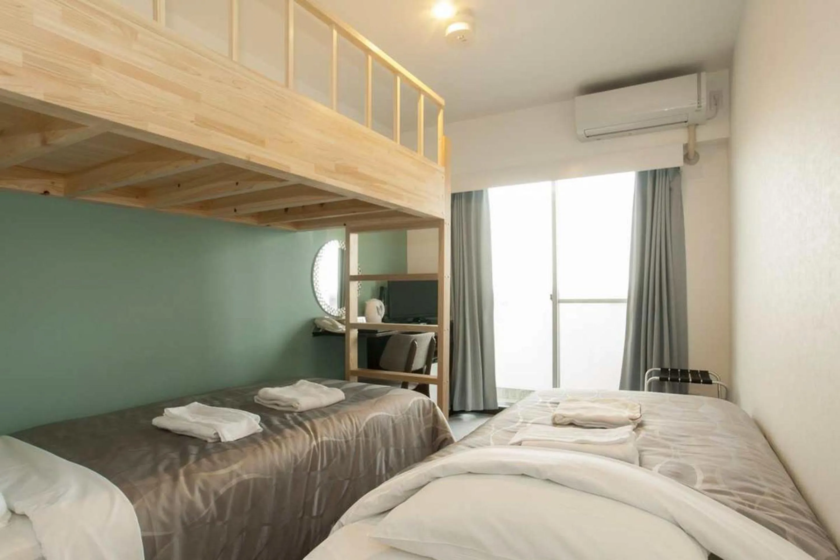 Bed in Global Resort Miyajima View