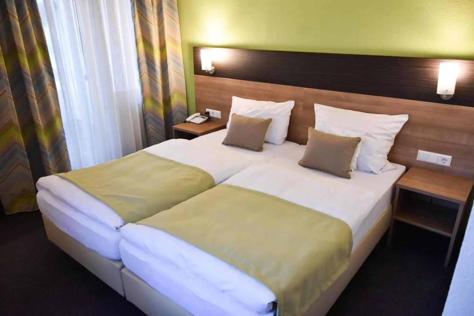 Photo of the whole room, Bed in Martins Klause Airport Messe Hotel - Self Check-In