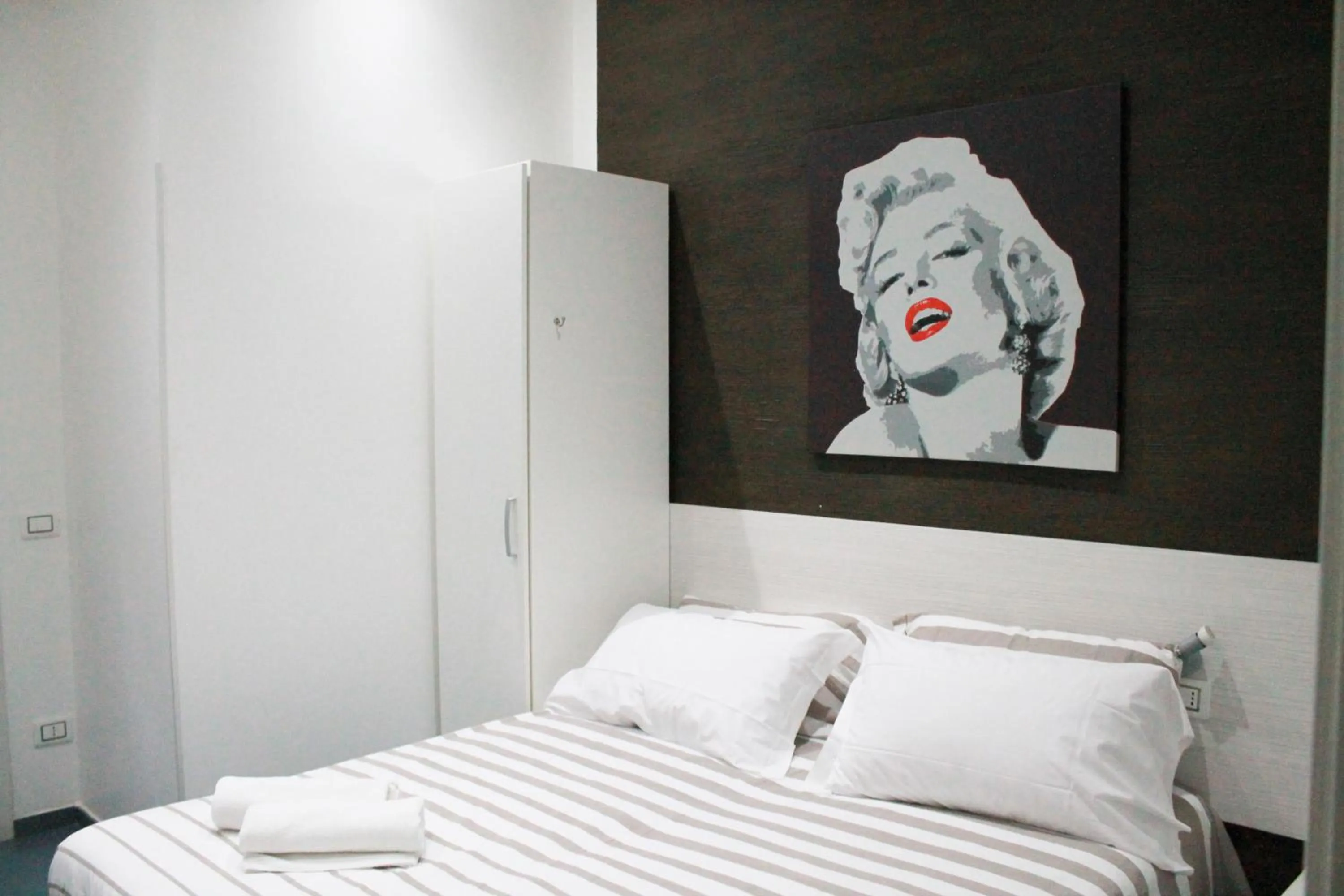 Photo of the whole room, Bed in Mascalzone latino luxury rooms