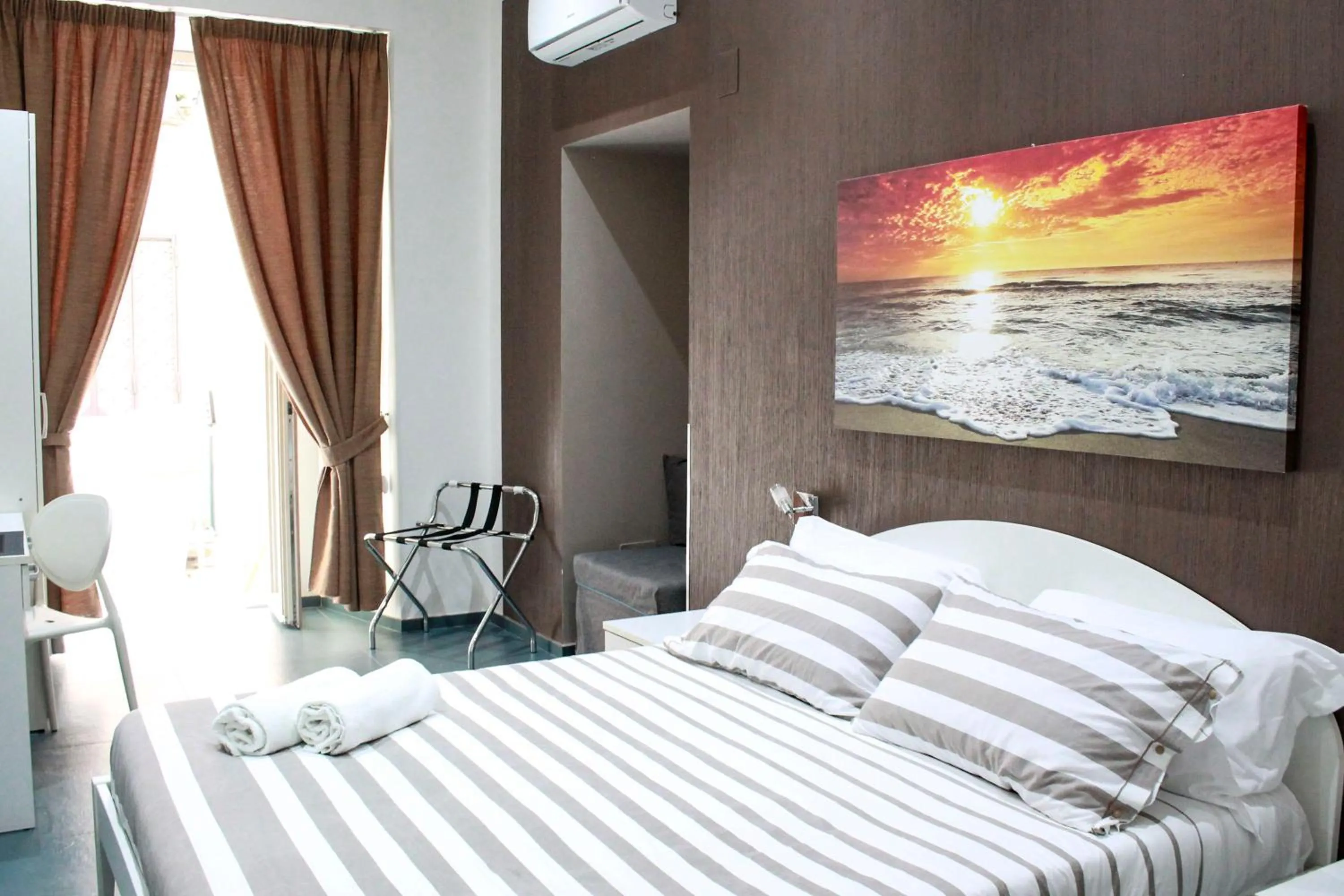 Photo of the whole room, Bed in Mascalzone latino luxury rooms