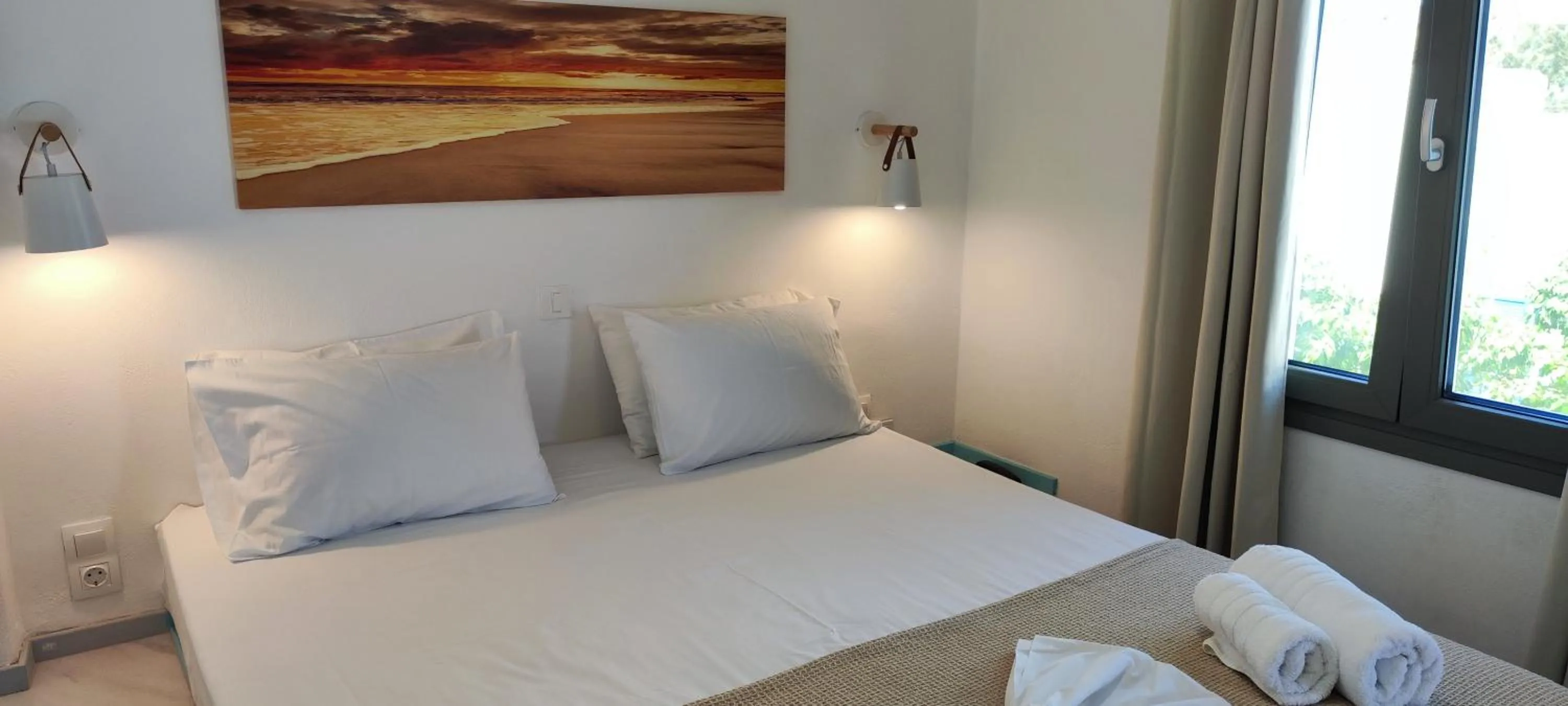 Bed in Ragousis Apartments