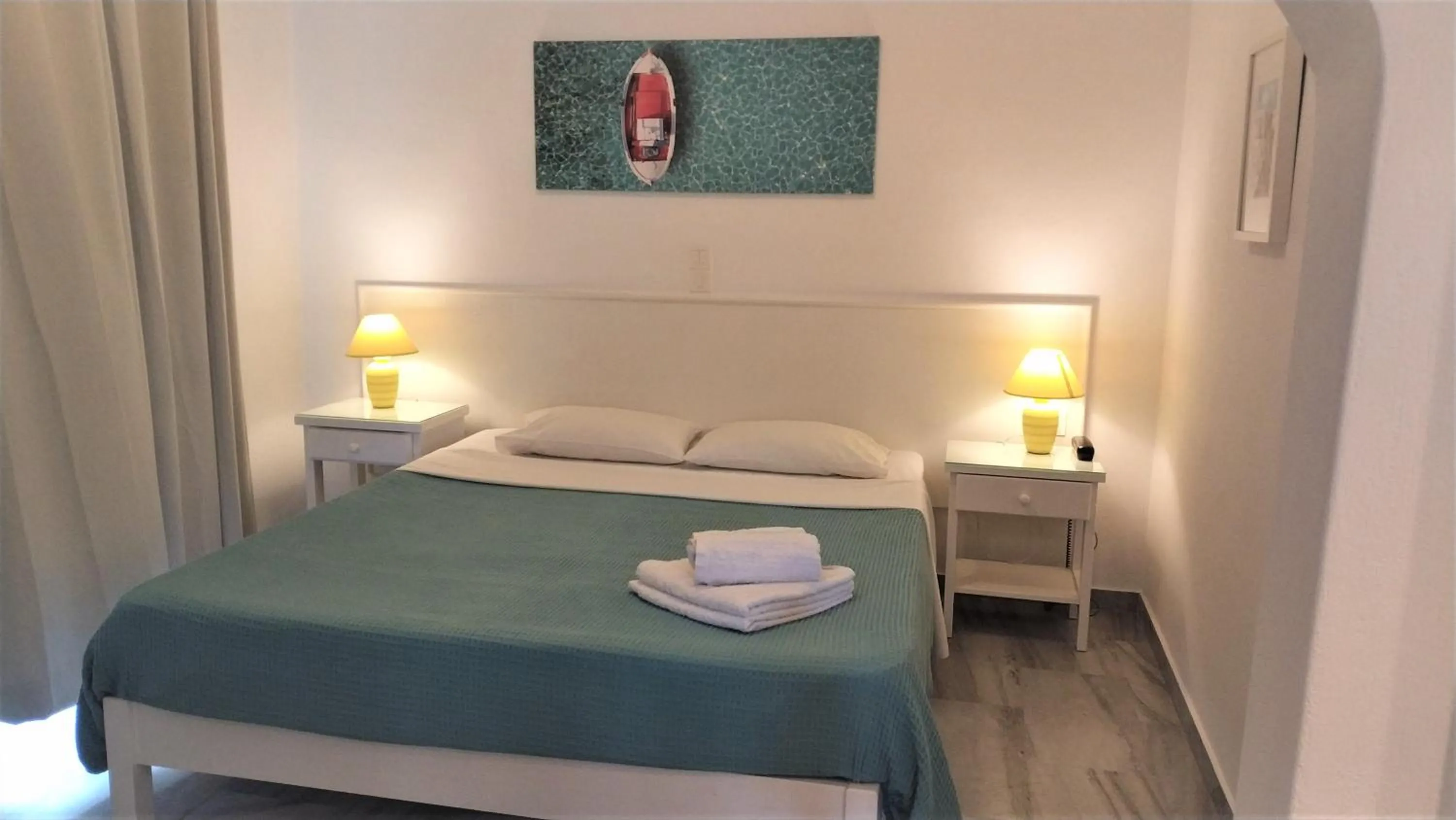 Bed in Ragousis Apartments