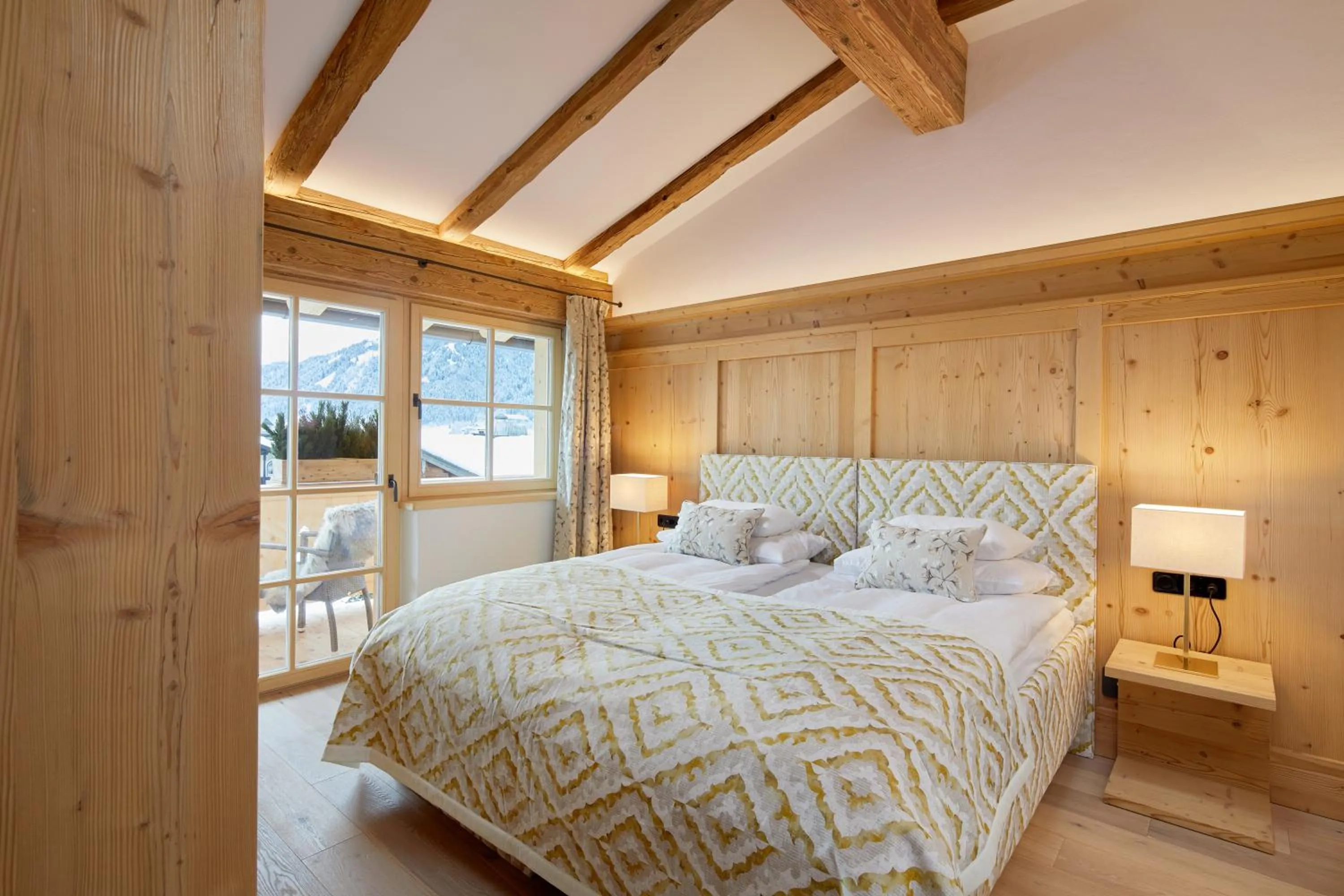 Bed in Tennerhof Luxury Chalets