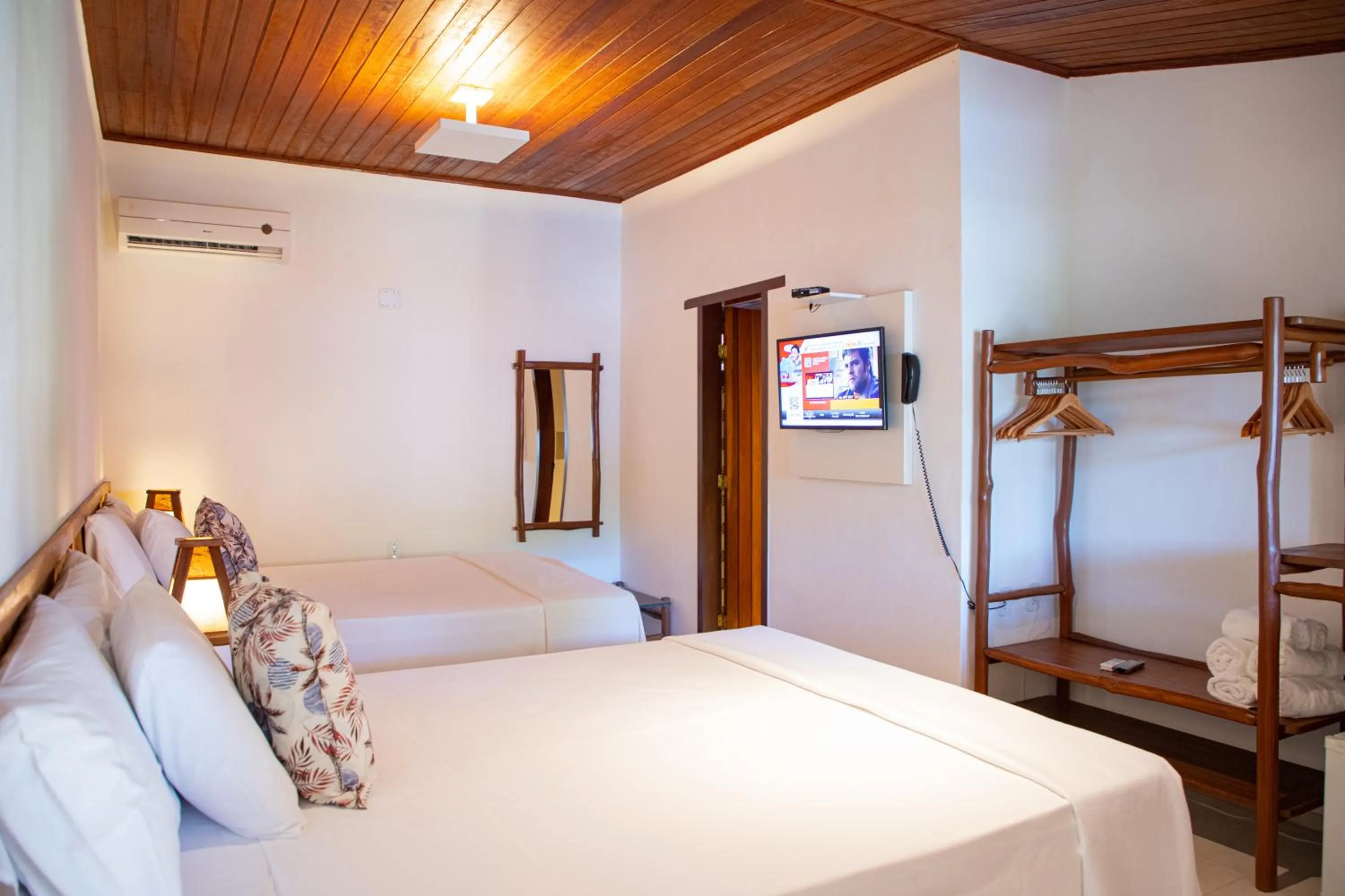 Bed in Tororao Hotel Pousada