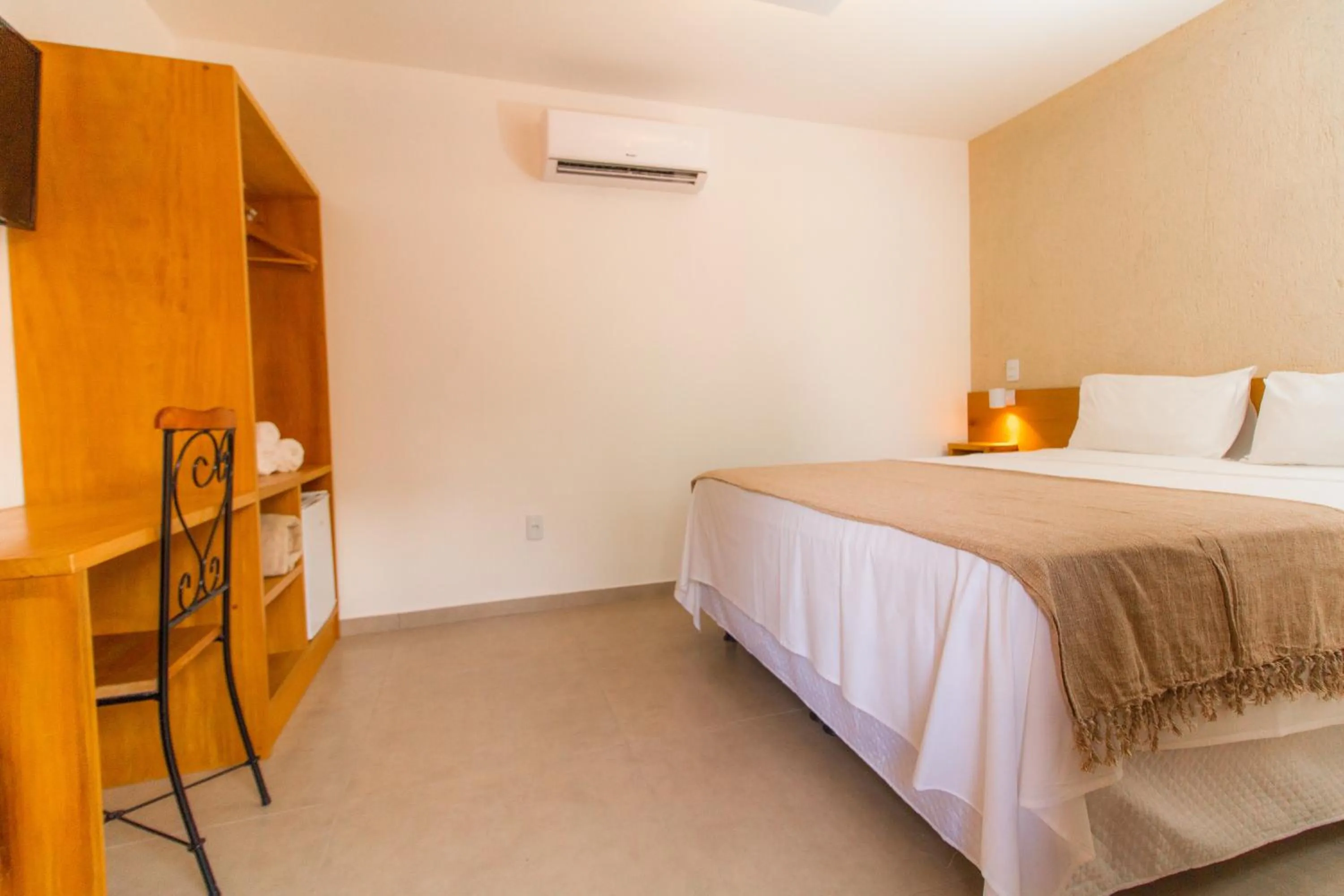 Bed in Tororao Hotel Pousada