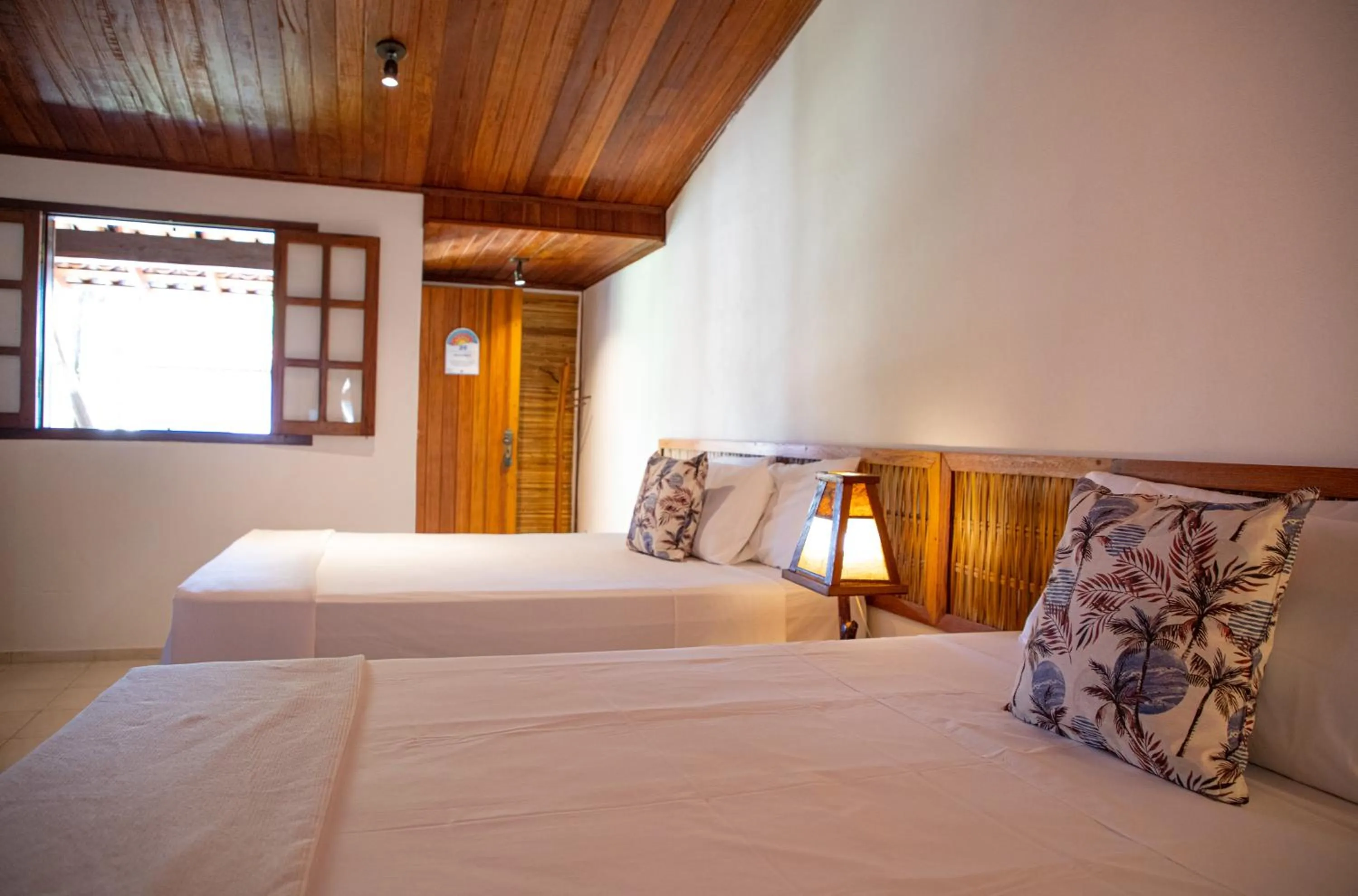 Bed in Tororao Hotel Pousada