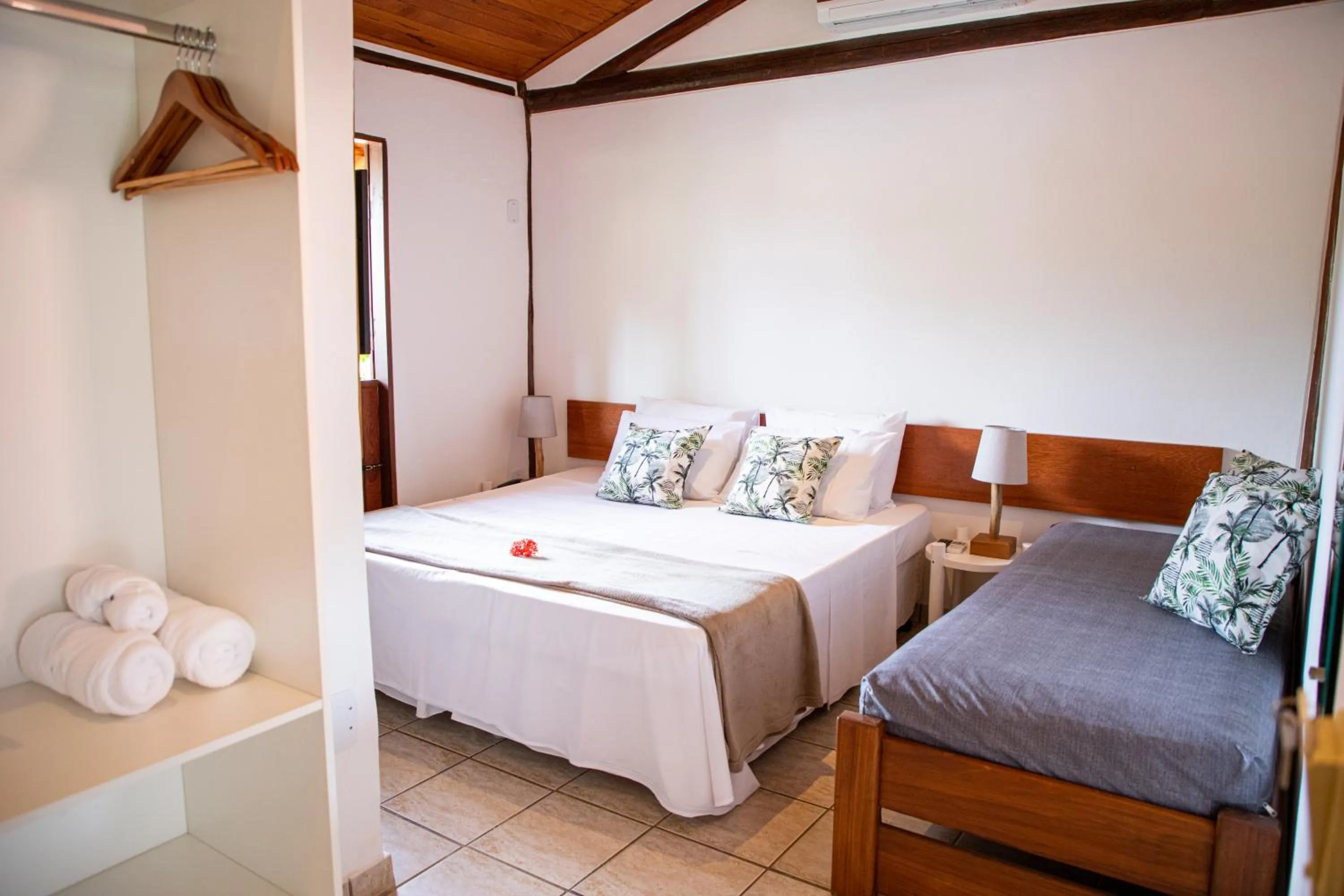 Bed in Tororao Hotel Pousada