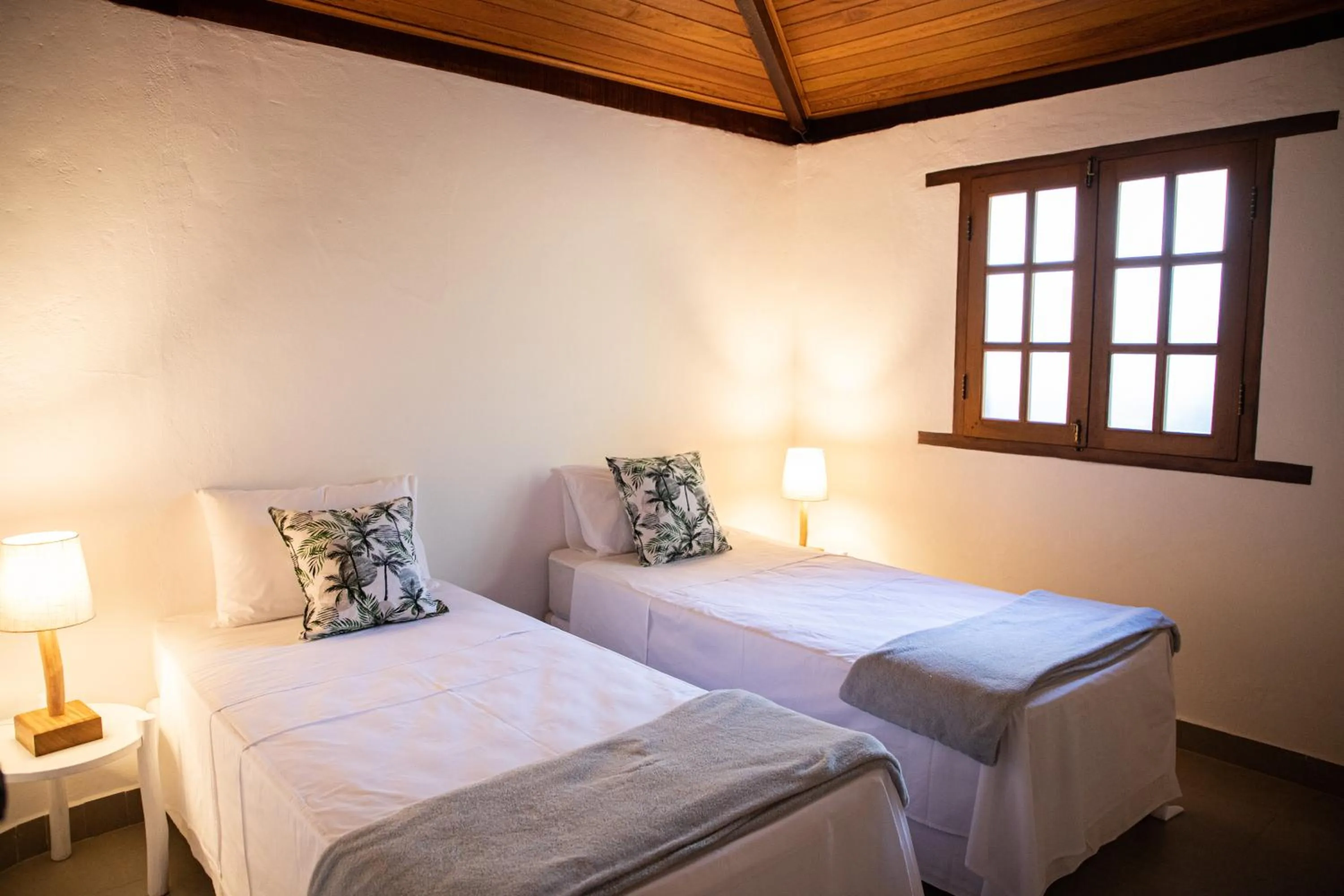 Bed in Tororao Hotel Pousada