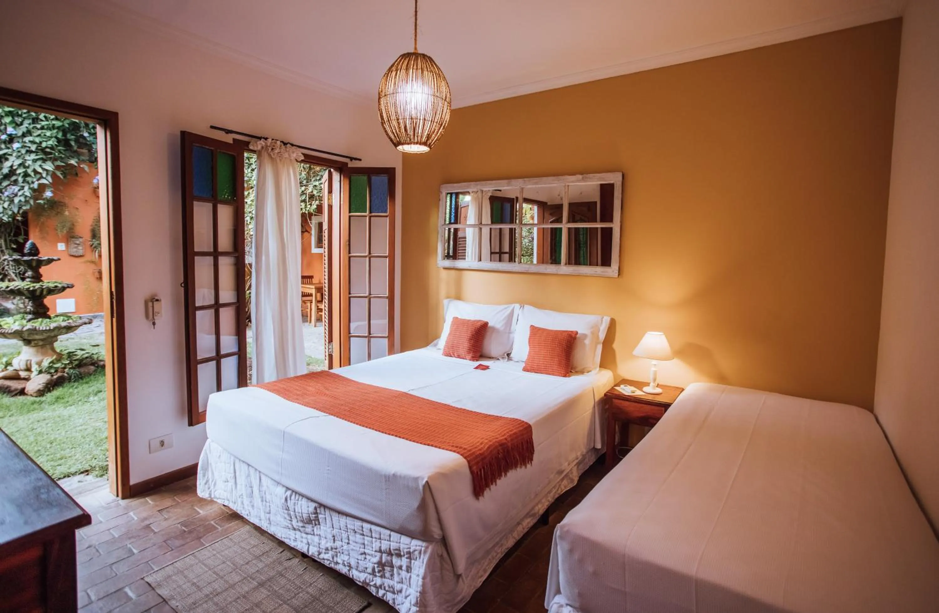 Bed in Pousada Terra Madre