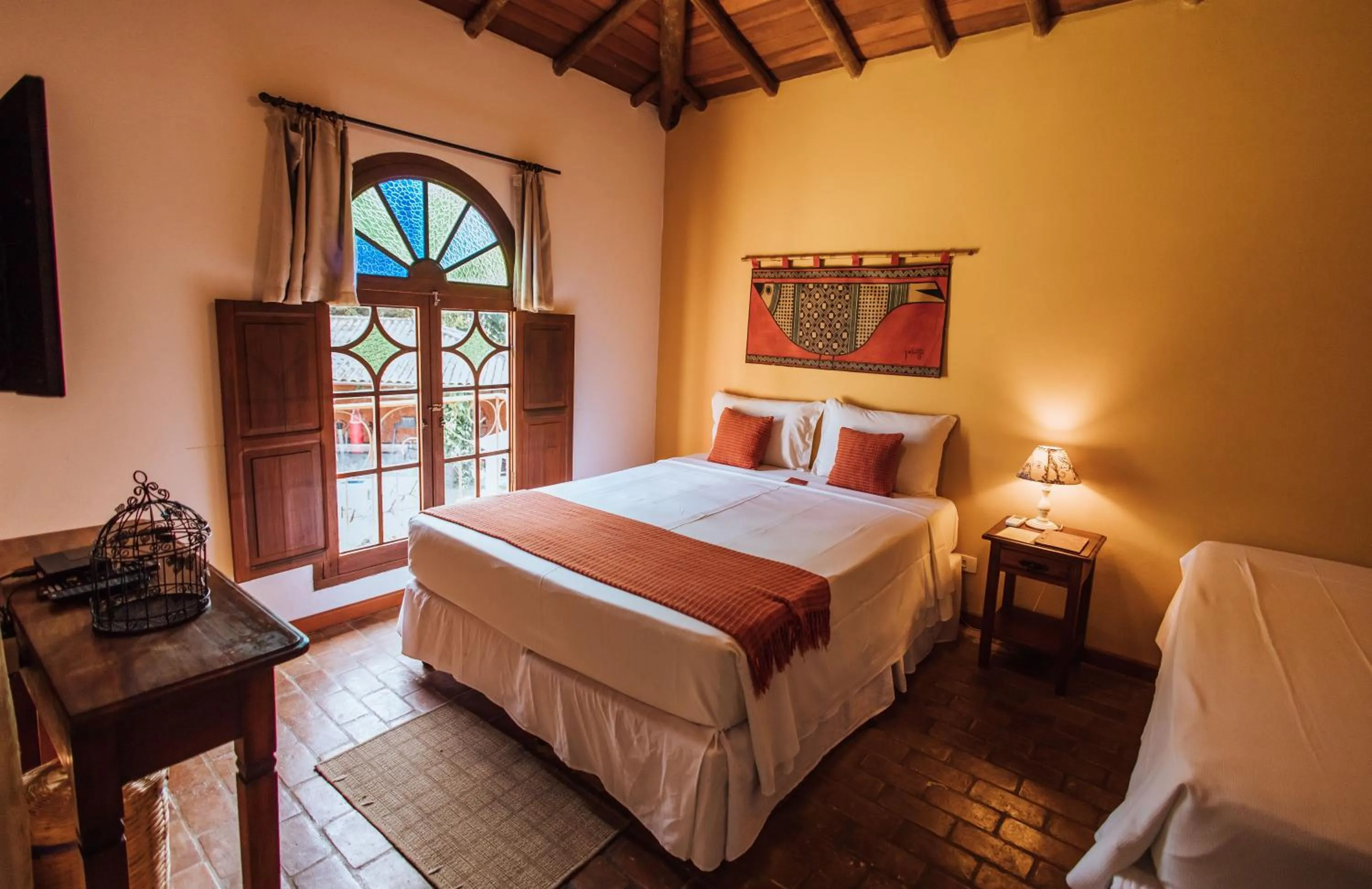 Bed in Pousada Terra Madre