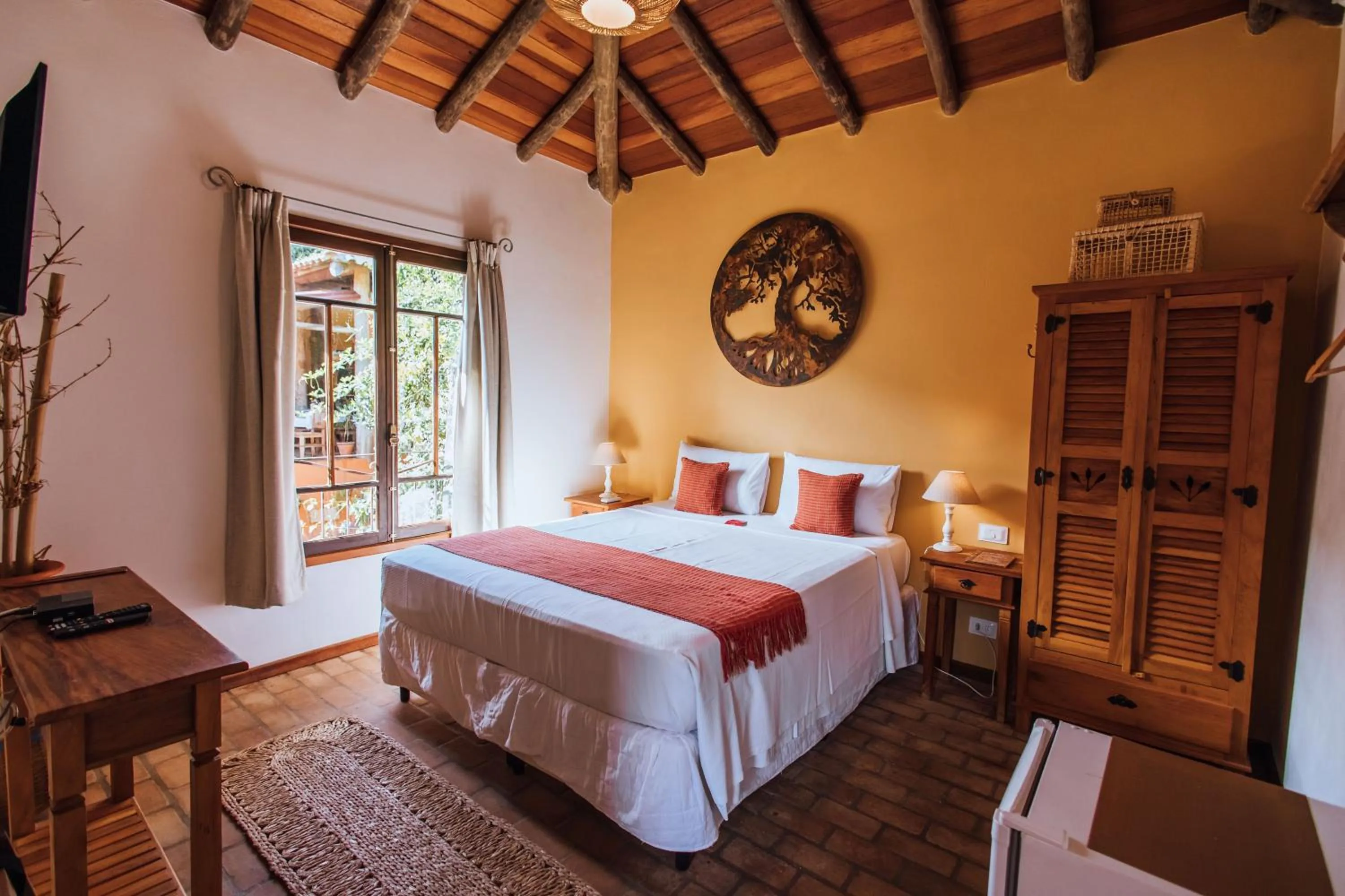 Bed in Pousada Terra Madre