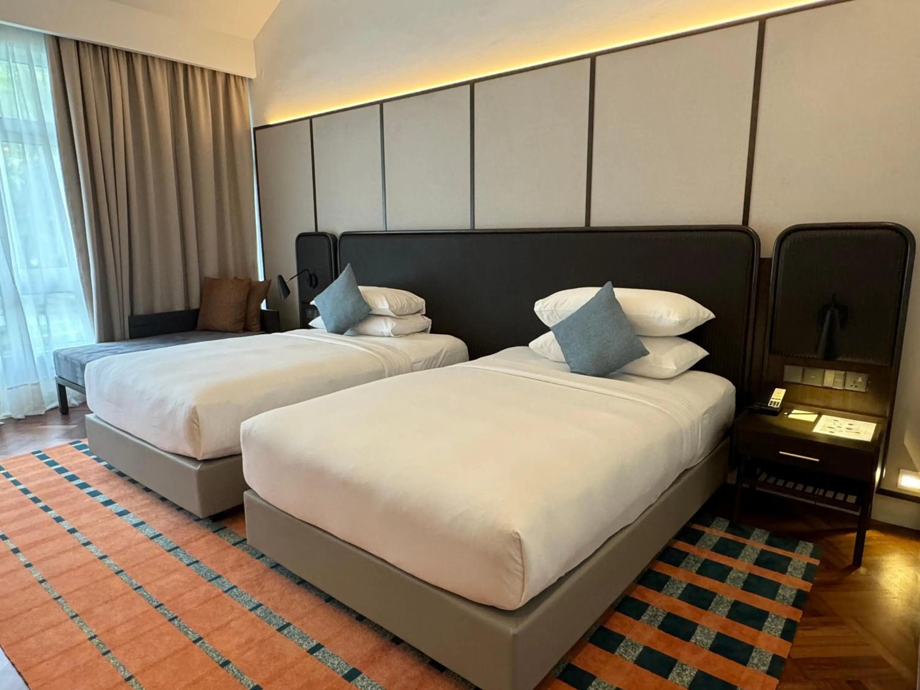 Bed in Lone Pine, Penang, a Tribute Portfolio Resort