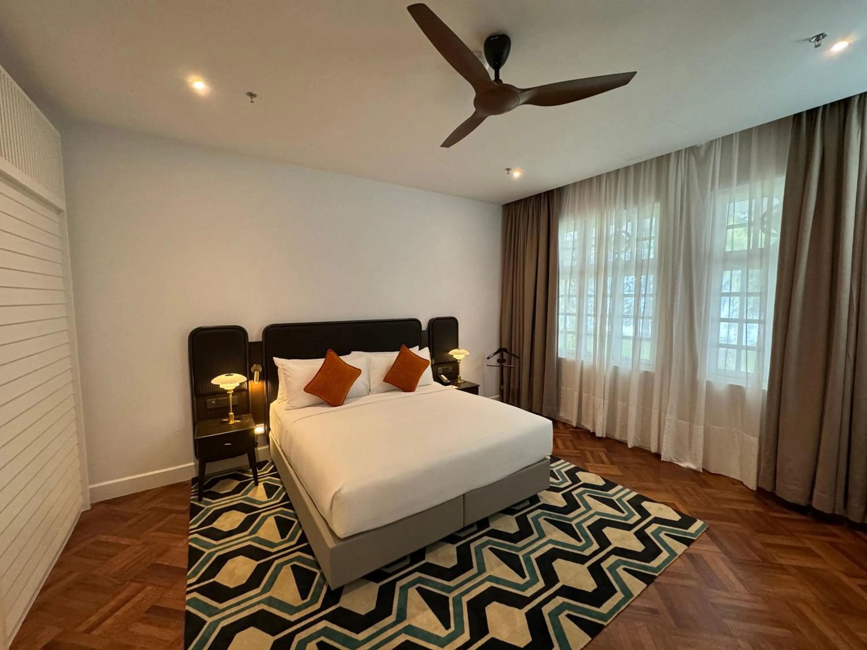 Bed in Lone Pine, Penang, a Tribute Portfolio Resort