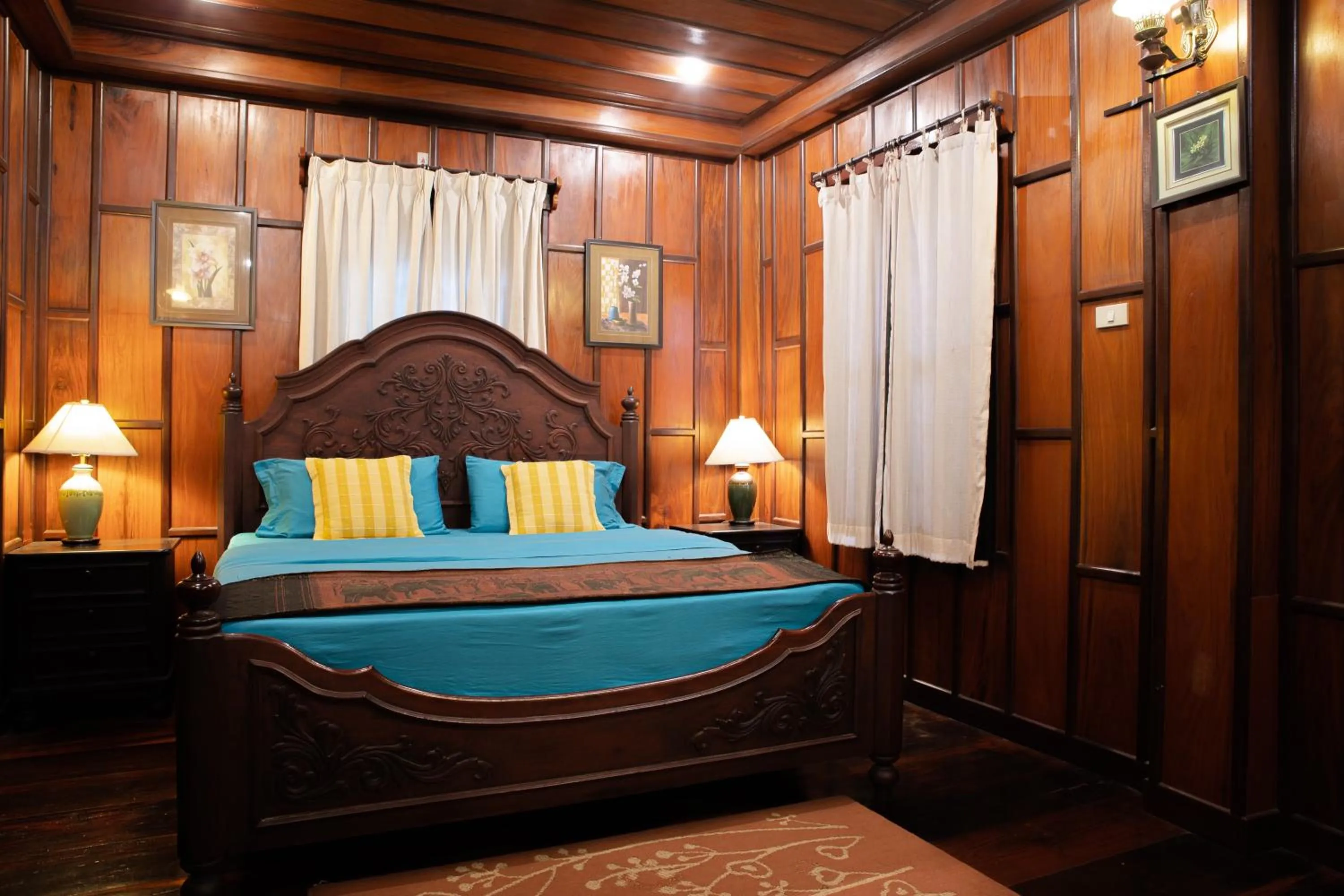 Bed in Villa Senesouk Luang Prabang