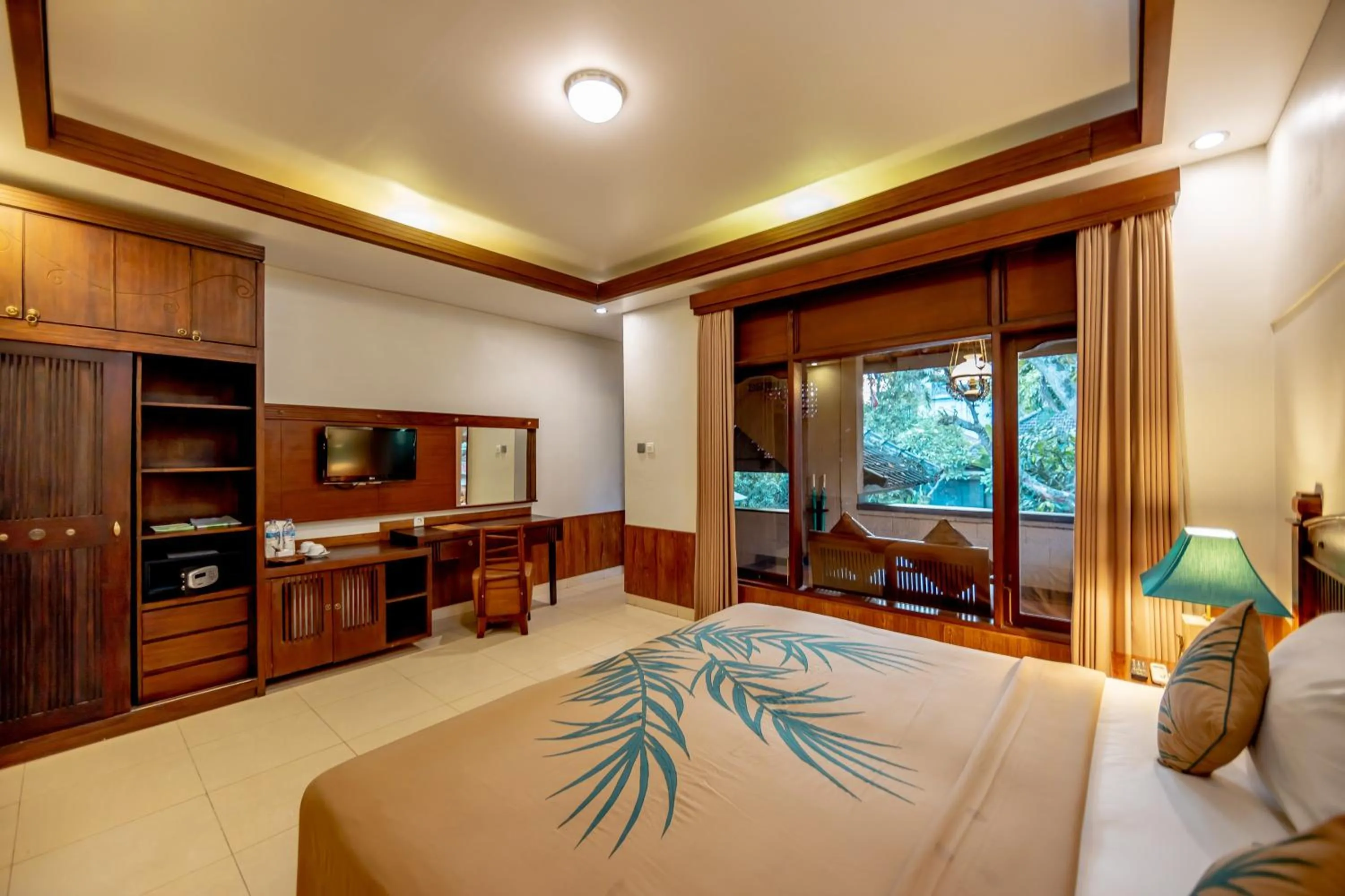 Photo of the whole room, Bed in De Munut Balinese Resort