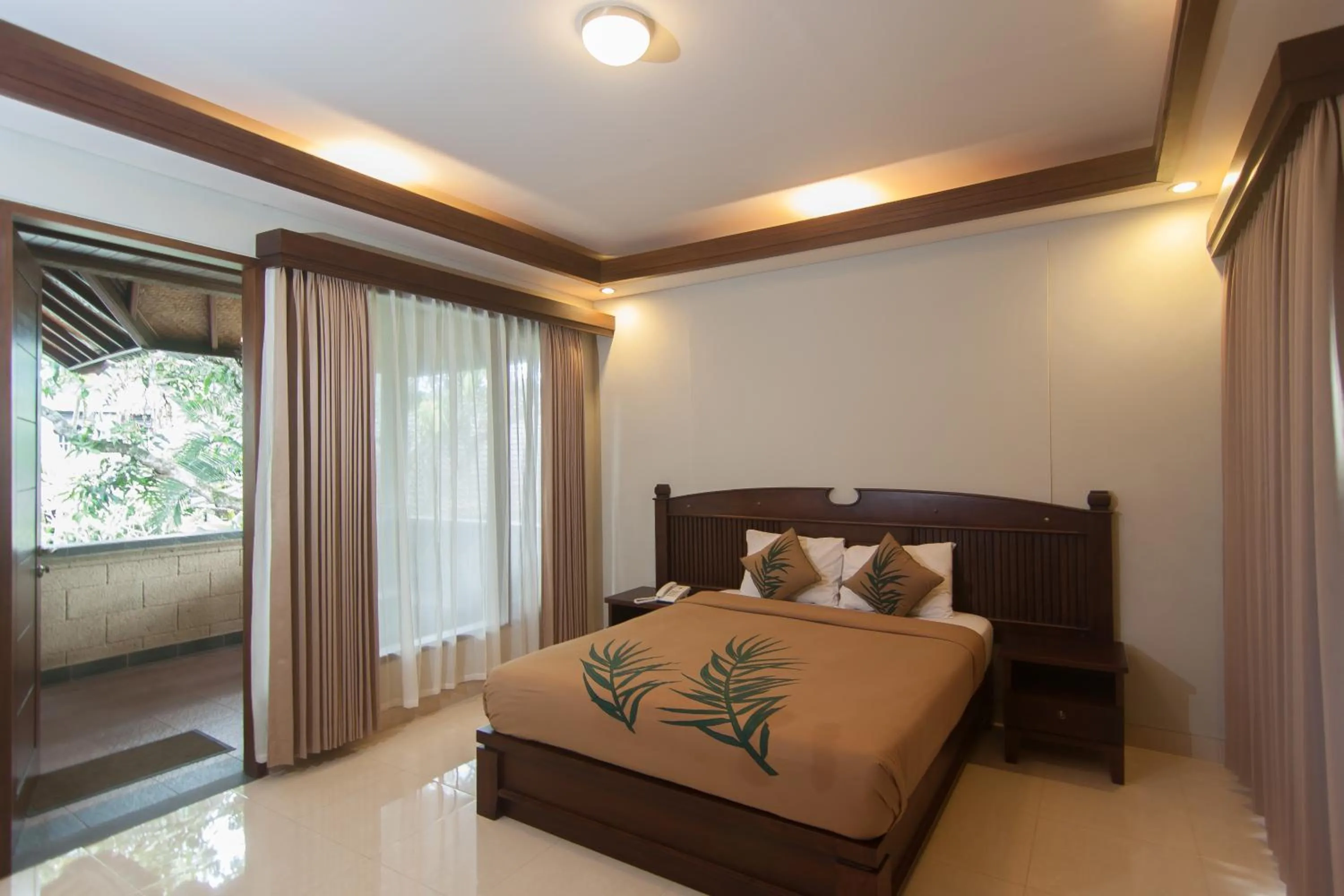 Bed in De Munut Balinese Resort