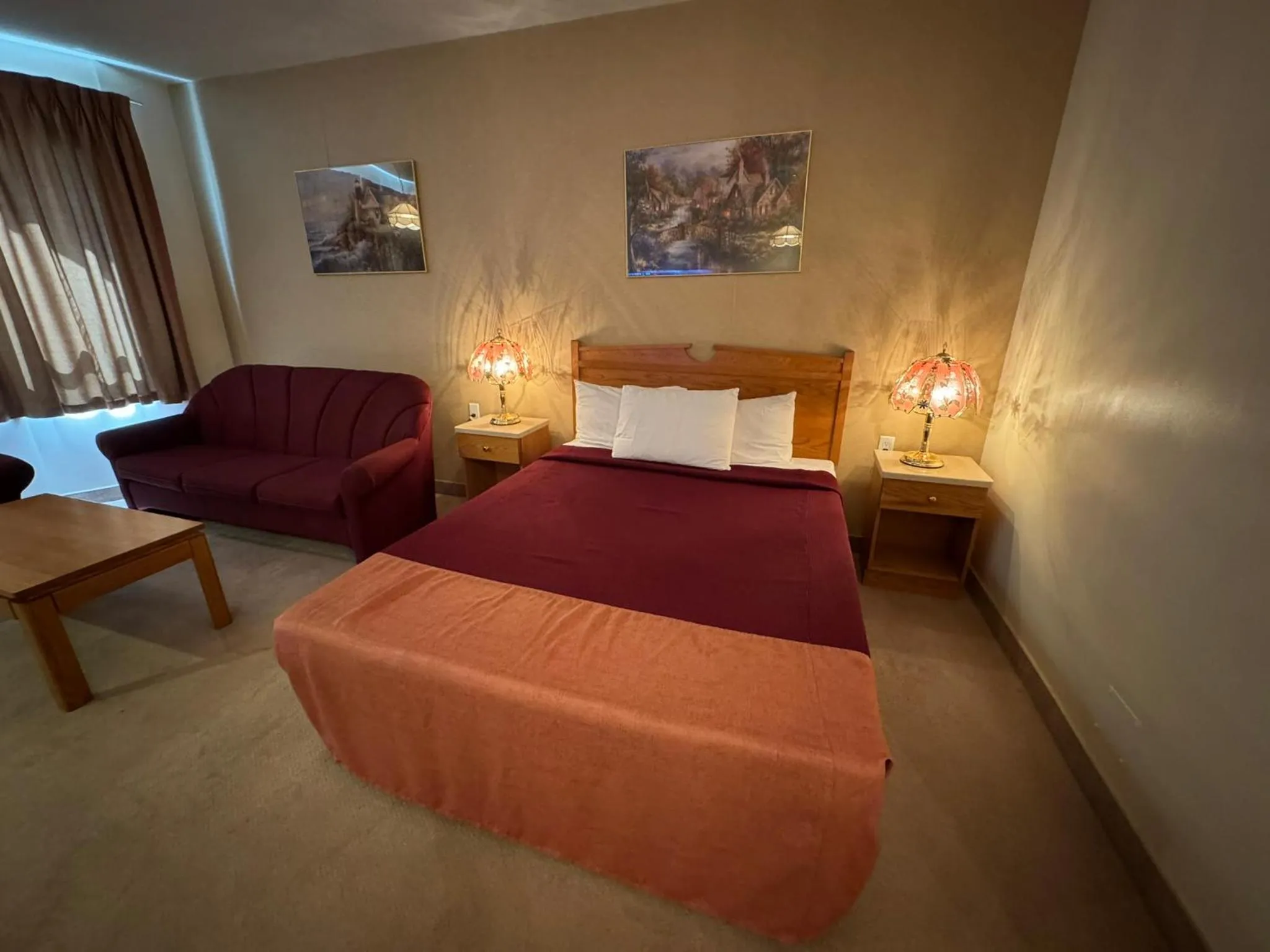 Bed in Western Budget Motel Ponoka