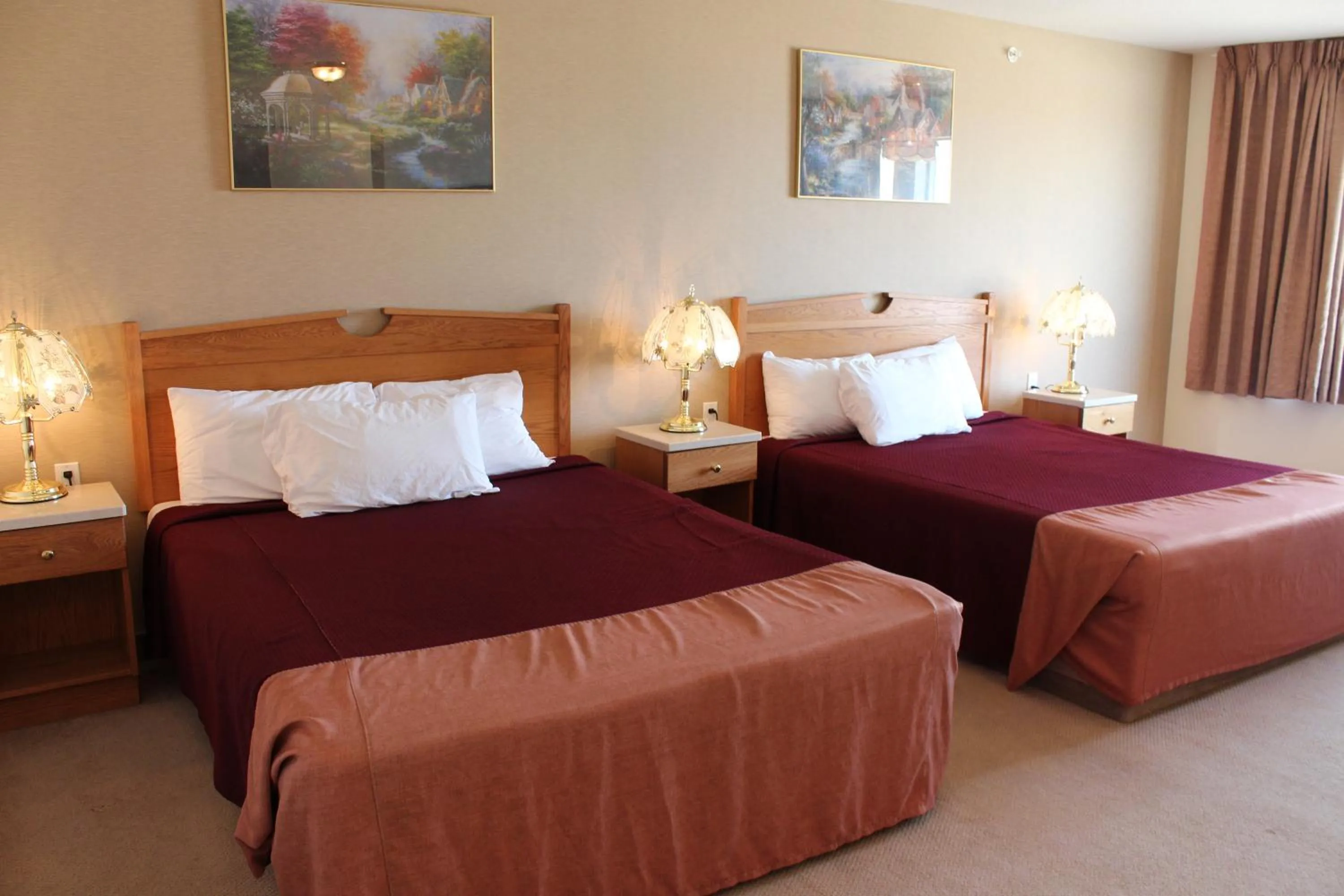 Bed in Western Budget Motel Ponoka