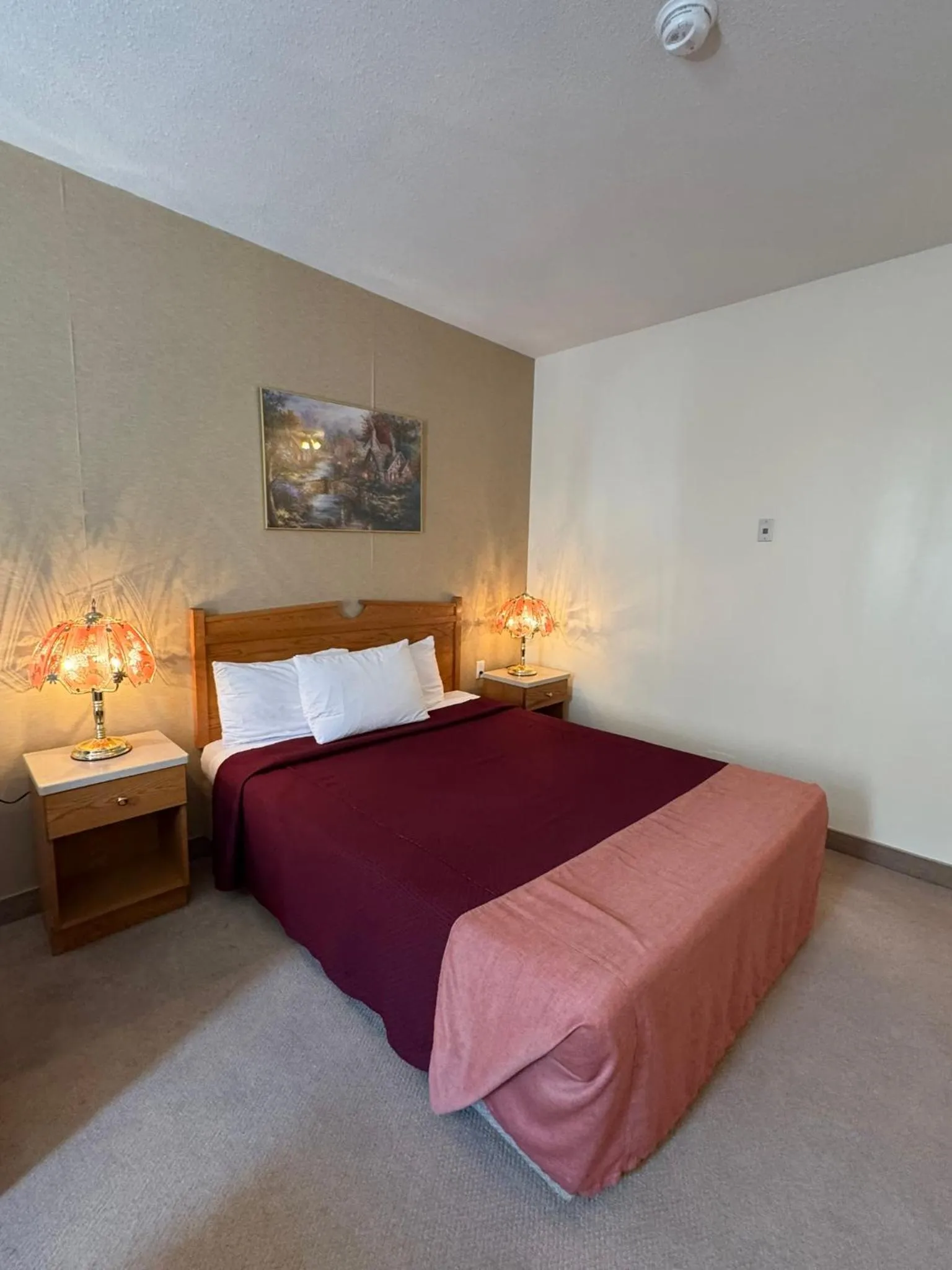 Bed in Western Budget Motel Ponoka