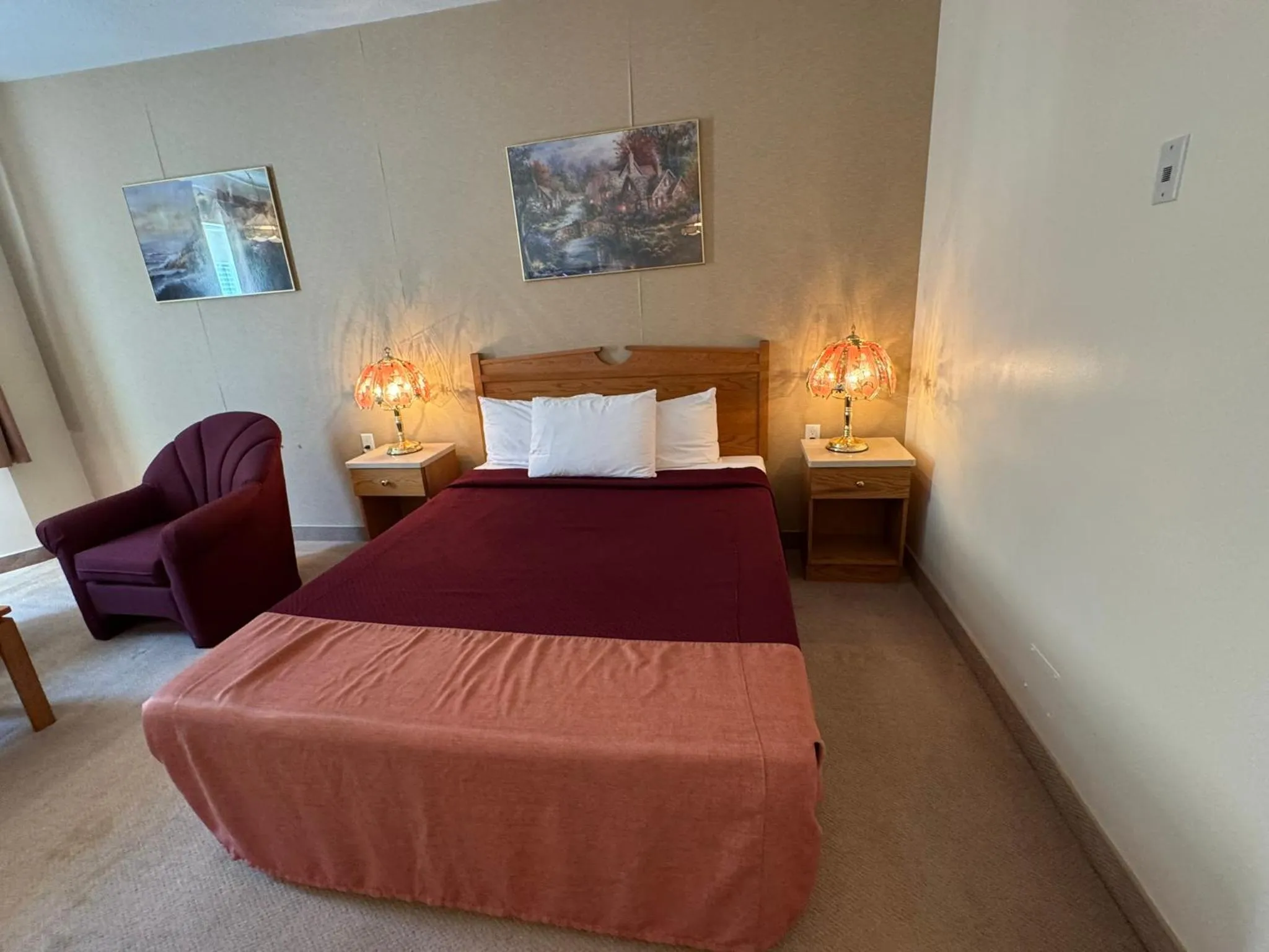 Bed in Western Budget Motel Ponoka