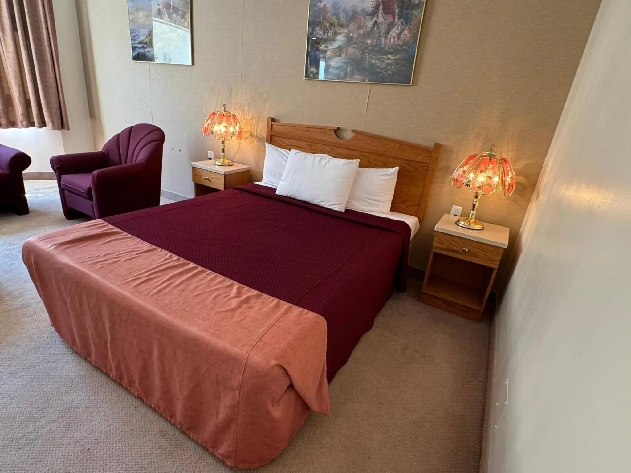 Bed in Western Budget Motel Ponoka