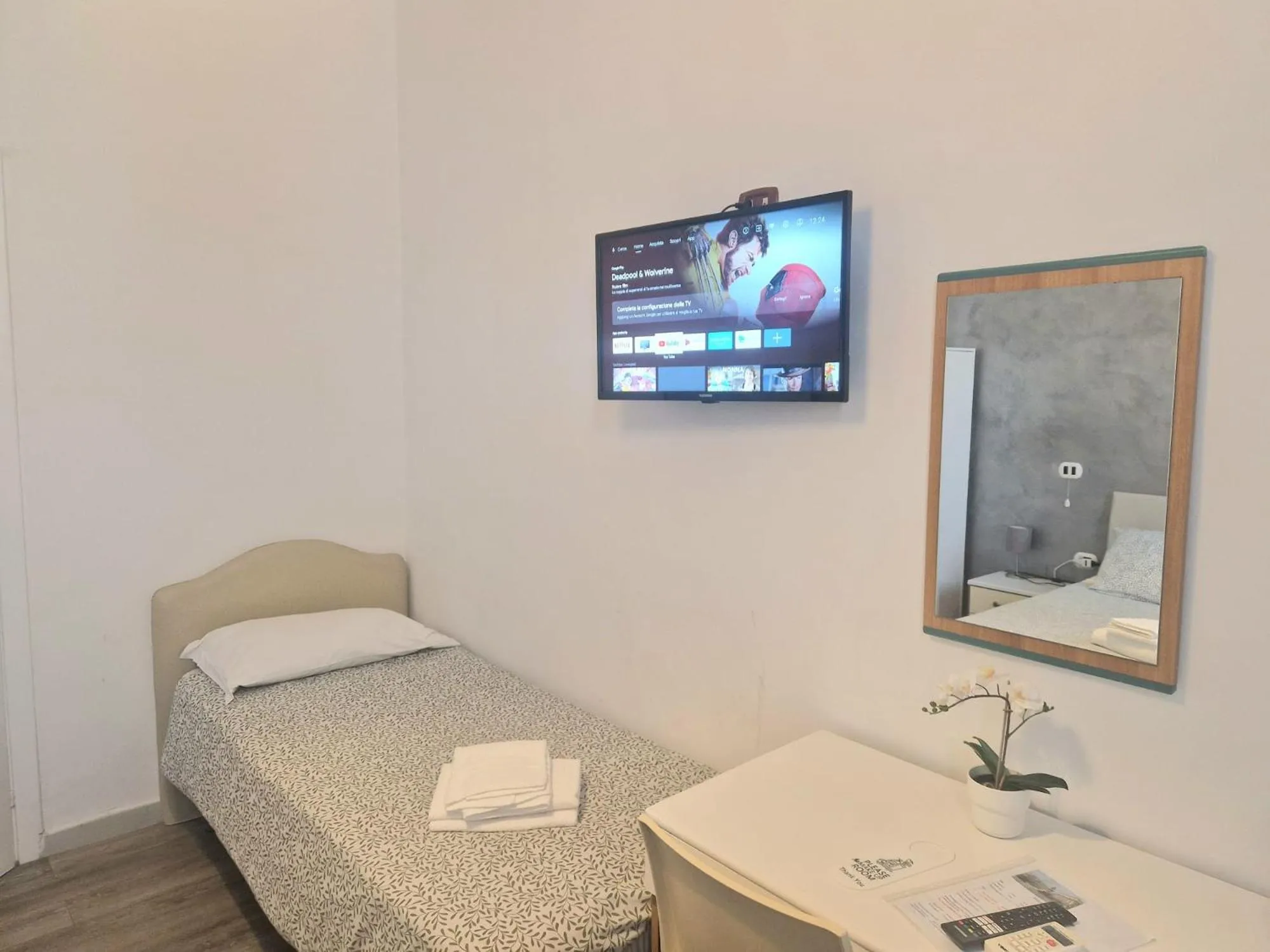 Bed in Hotel Le Orchidee