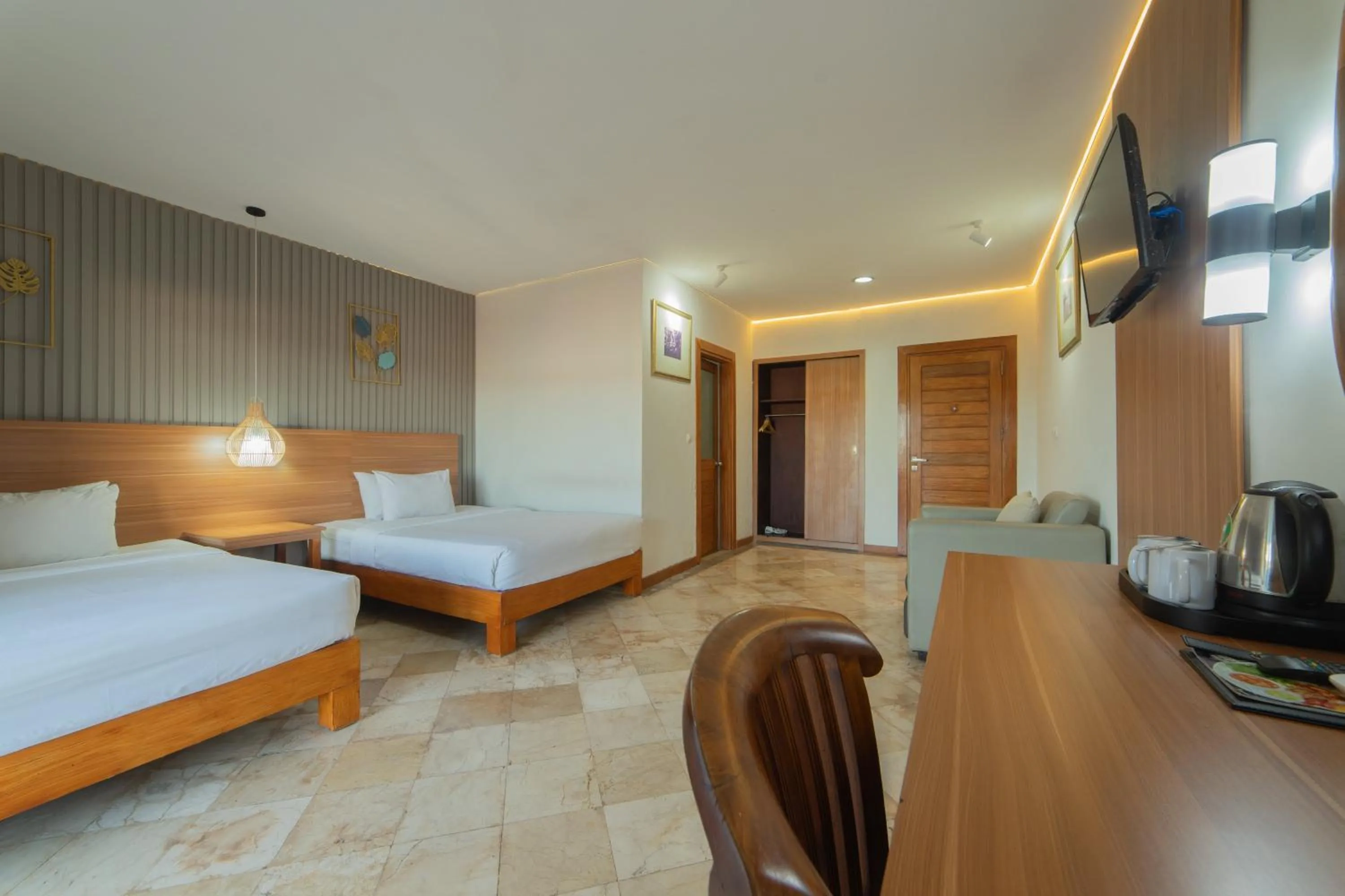 Bed in Nirmala Hotel Jimbaran