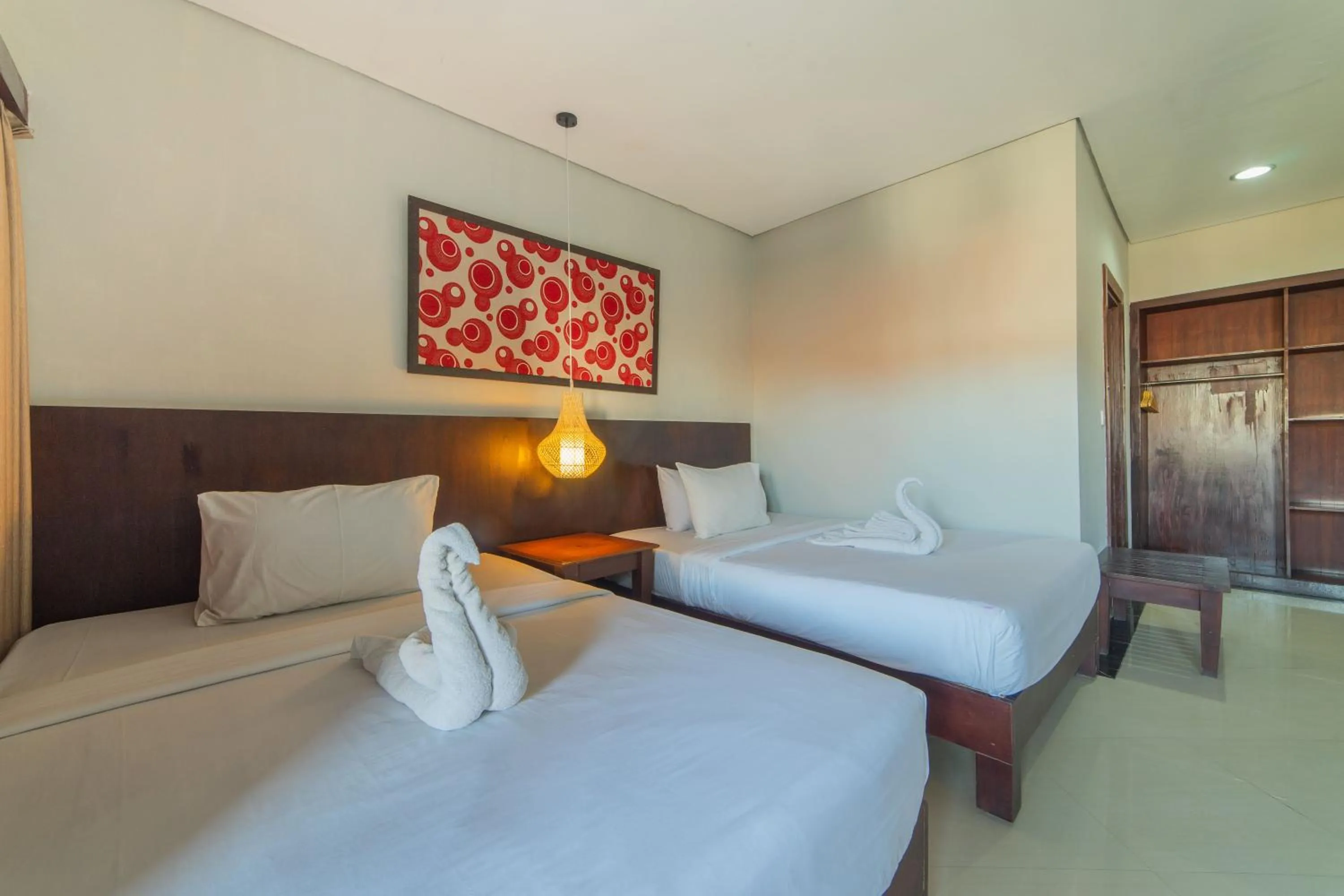 Bed in Nirmala Hotel Jimbaran