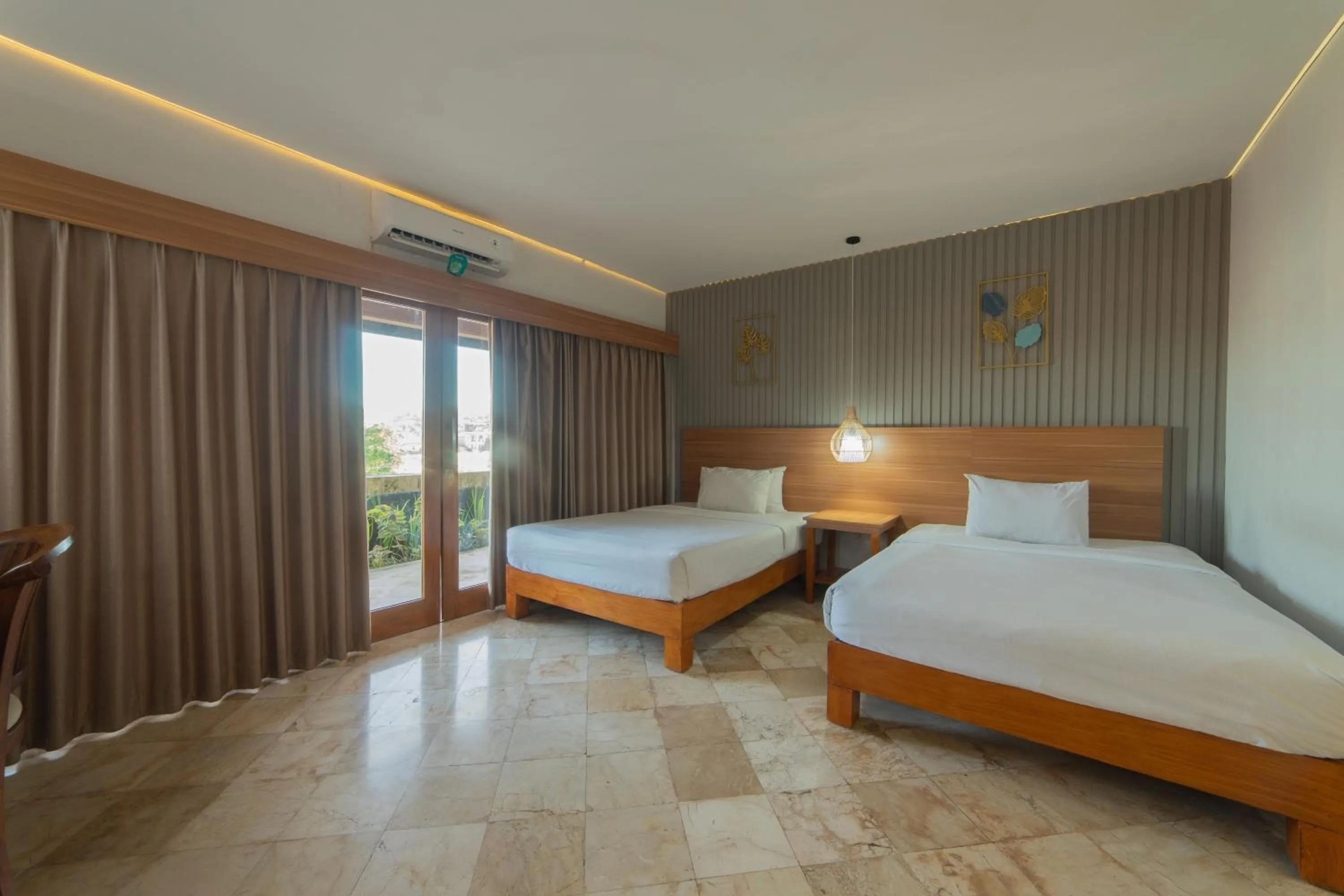 Bed in Nirmala Hotel Jimbaran