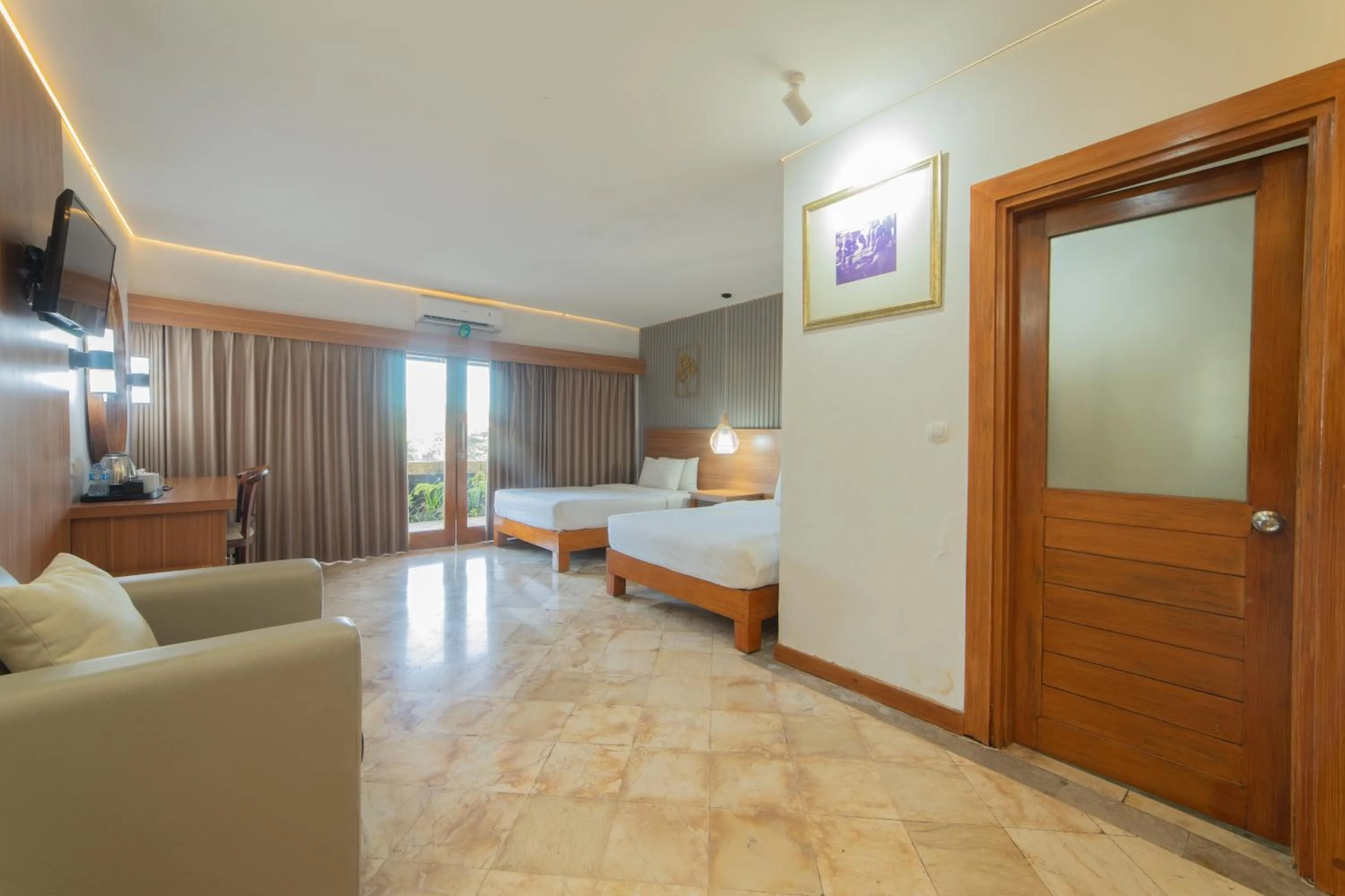 Bed in Nirmala Hotel Jimbaran