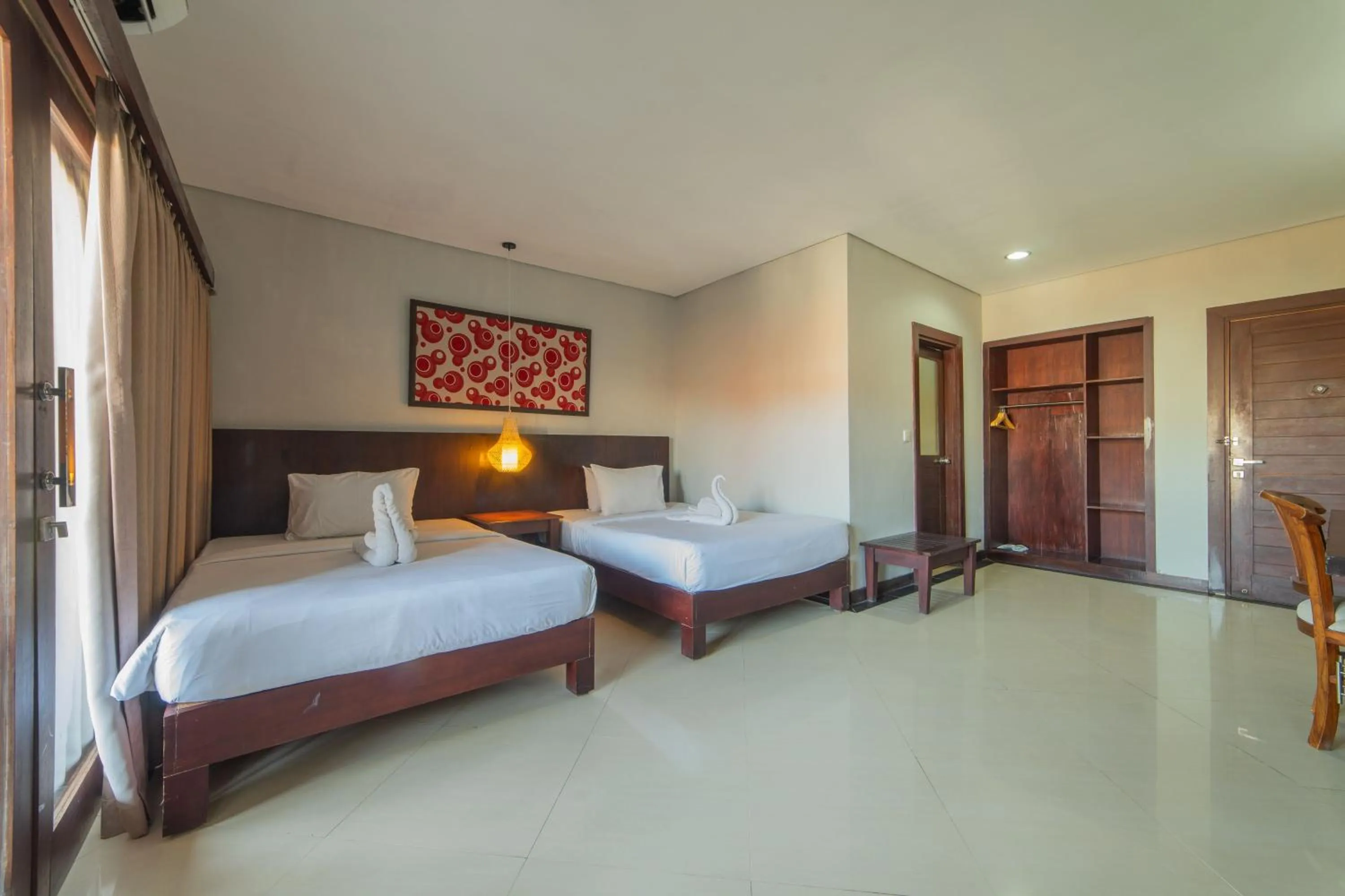 Bed in Nirmala Hotel Jimbaran