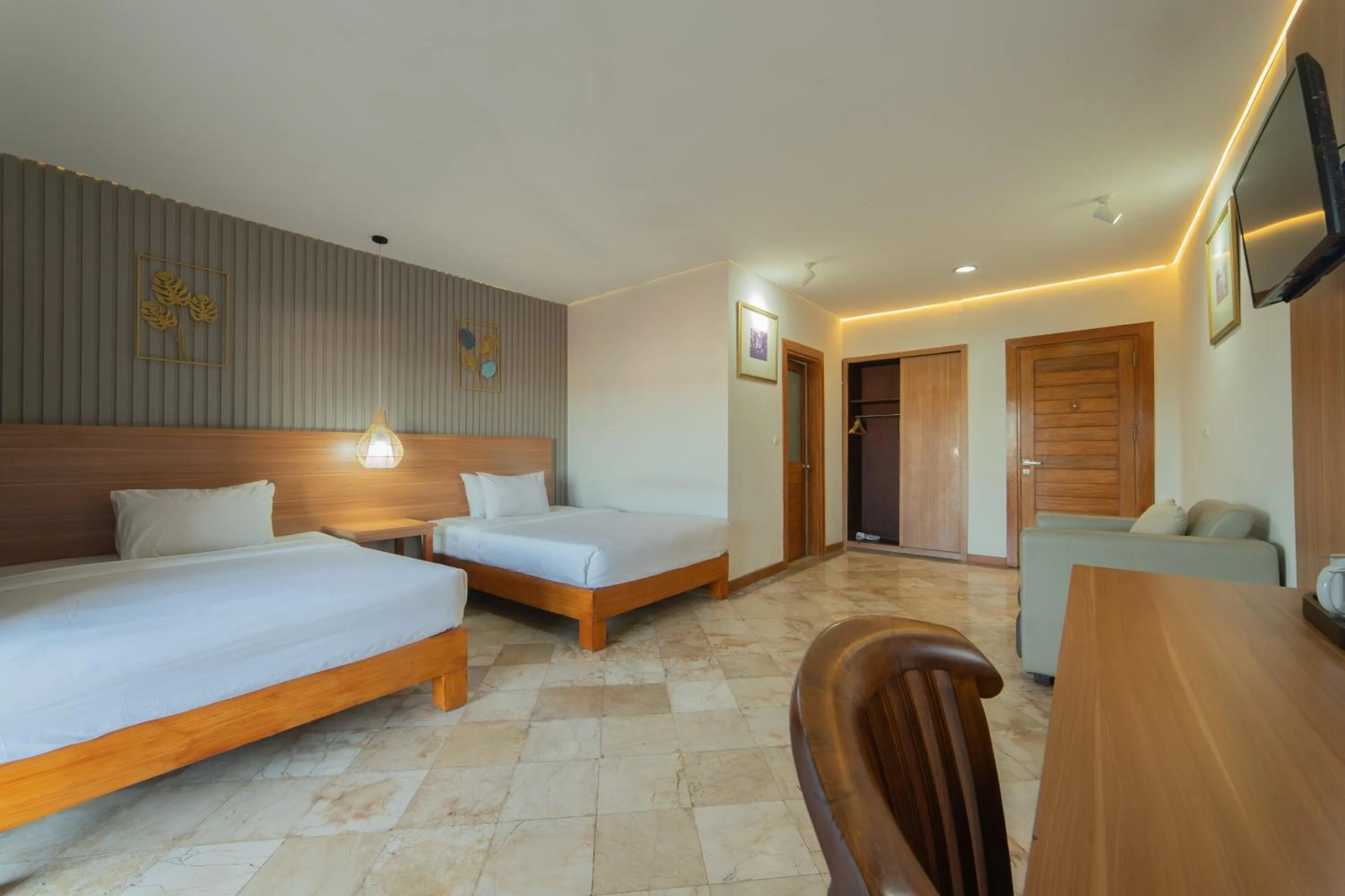 Bed in Nirmala Hotel Jimbaran