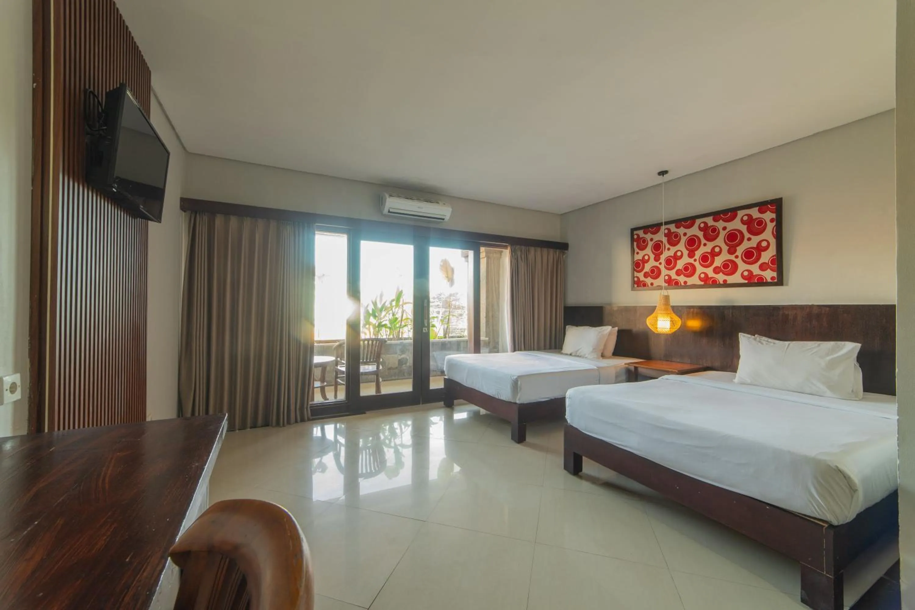Bed in Nirmala Hotel Jimbaran