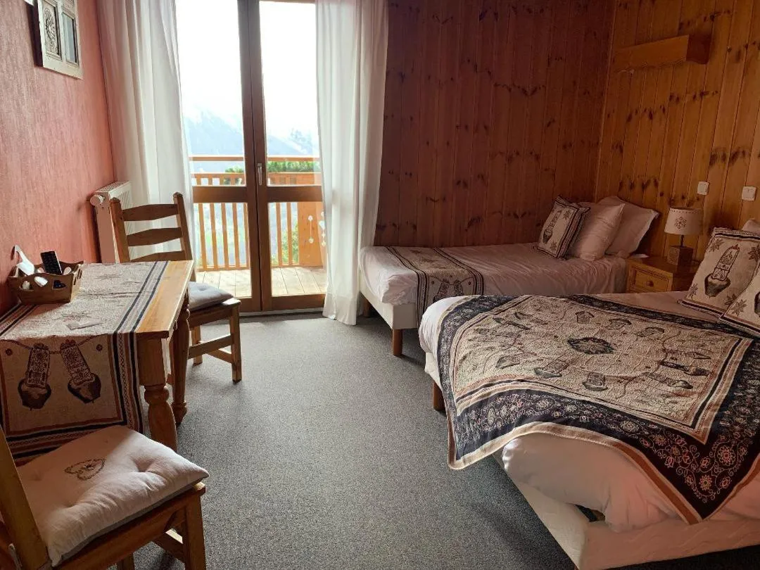Balcony/Terrace, Bed in Hotels Les Catrems & Le Montagnou
